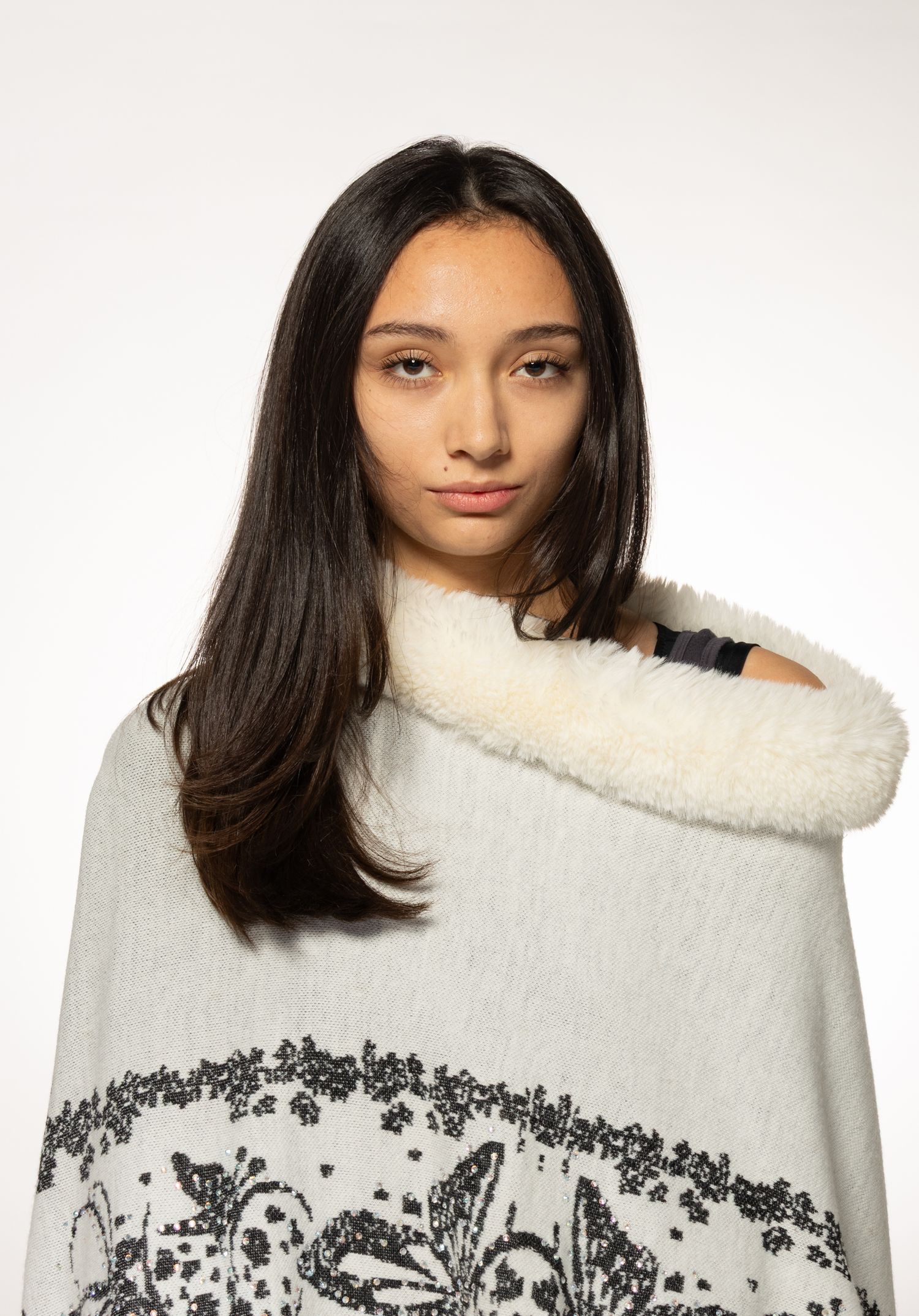 Female model headshot in front of white background