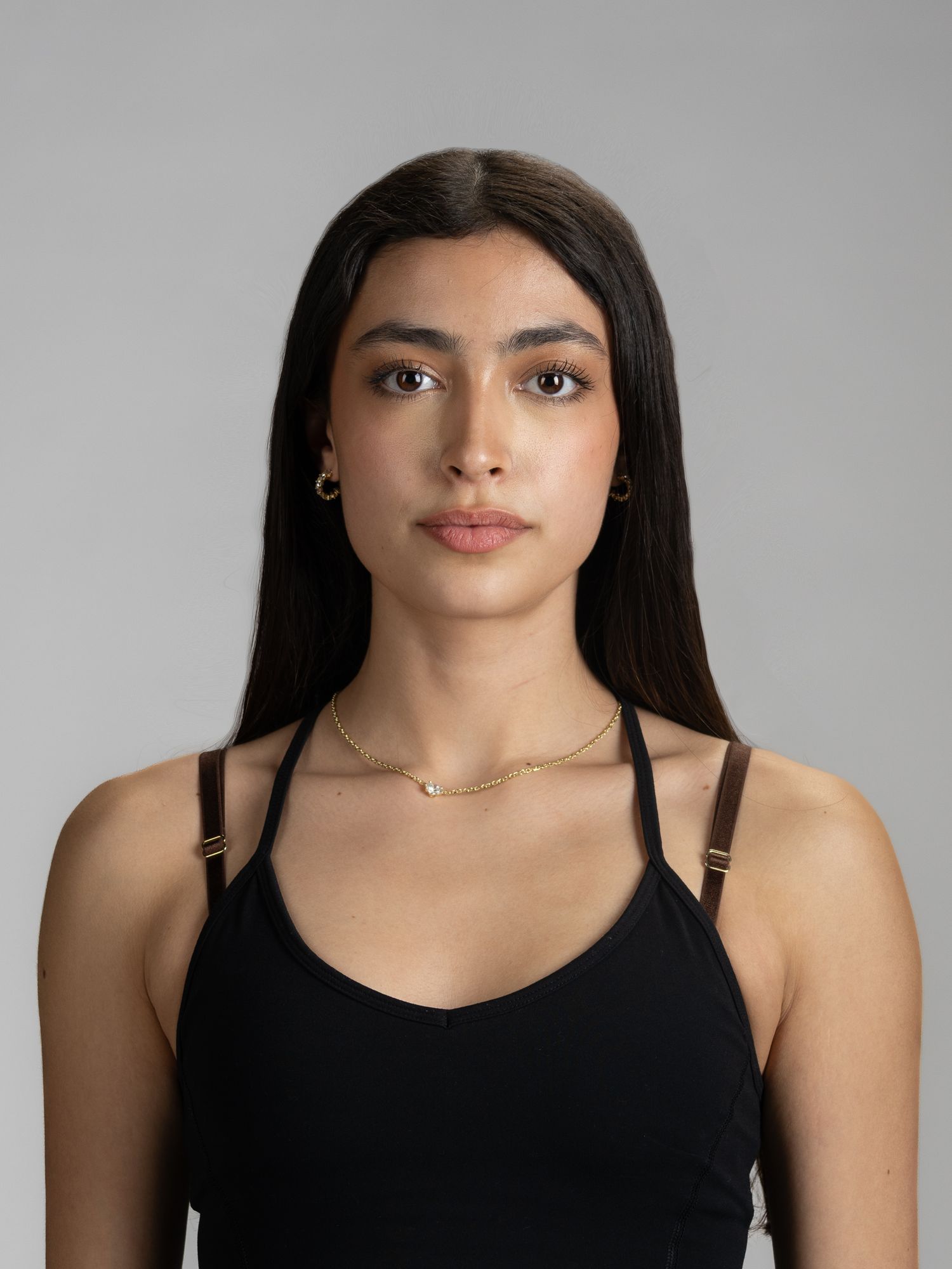 Female model headshot in front of white background
