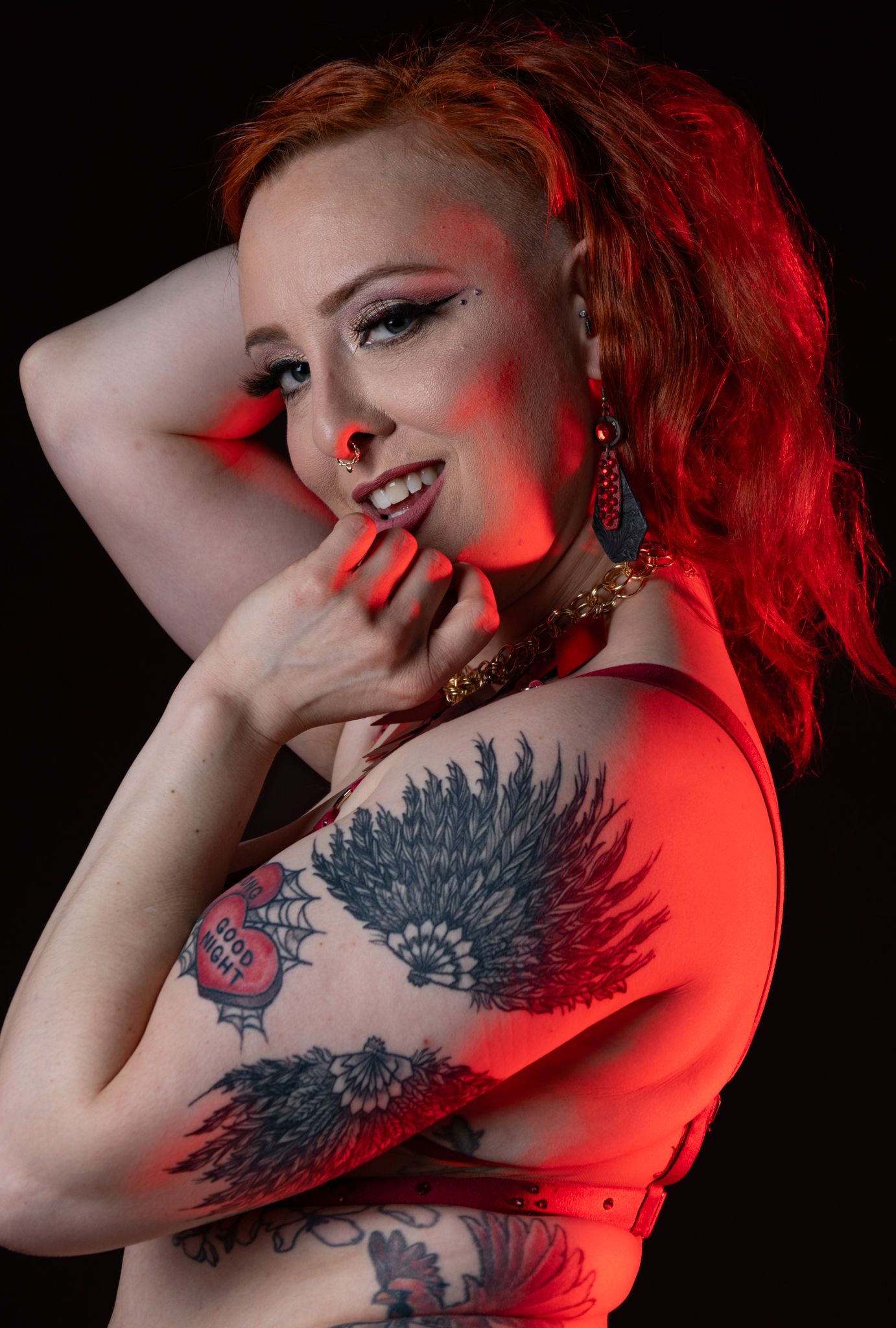 Female model with red accent lighting