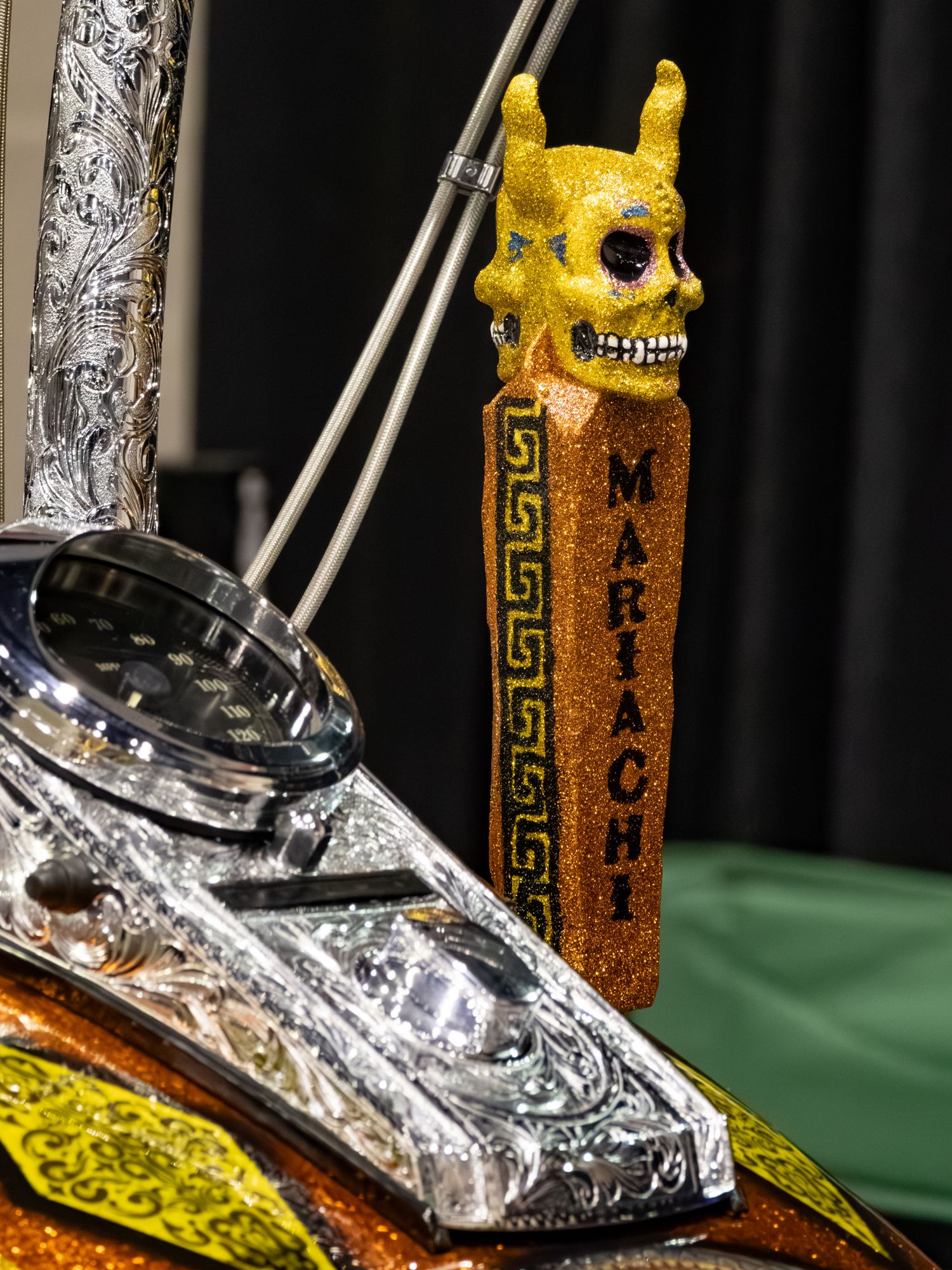 Chrome motorcycle with 'mariachi' skull