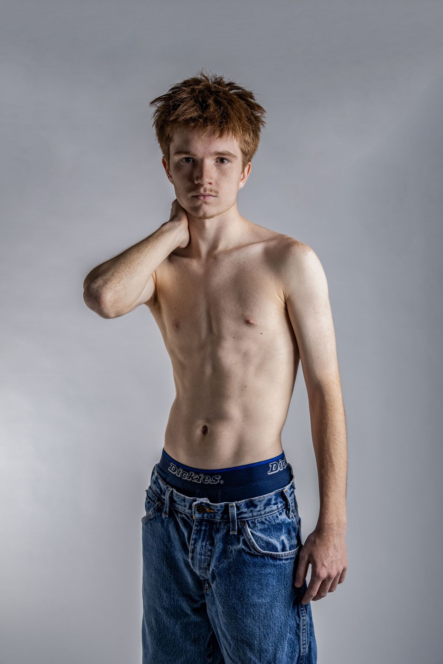 Male model posed in front of white background