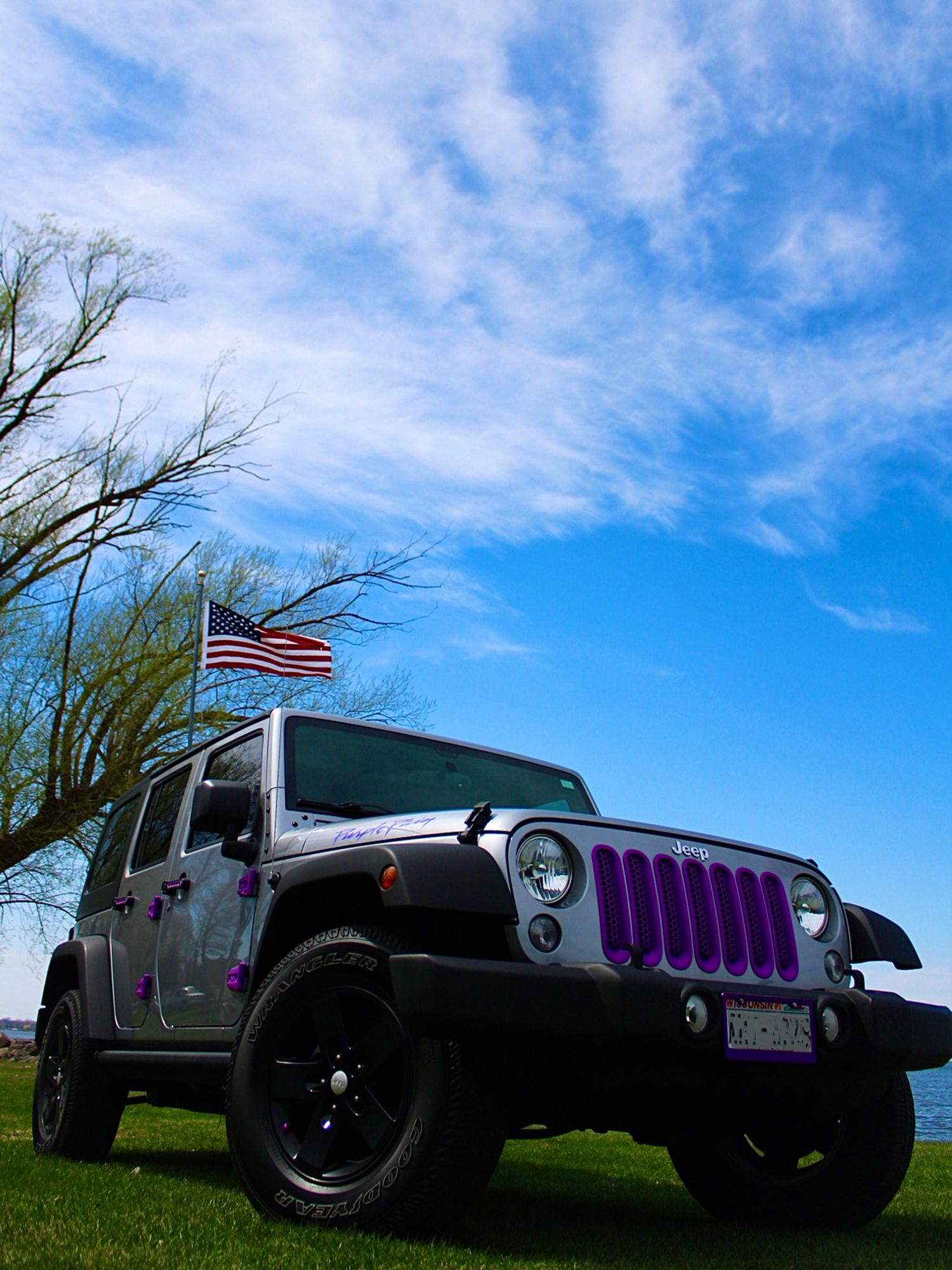 2018 Grey Jeep Wrangler with purple accents