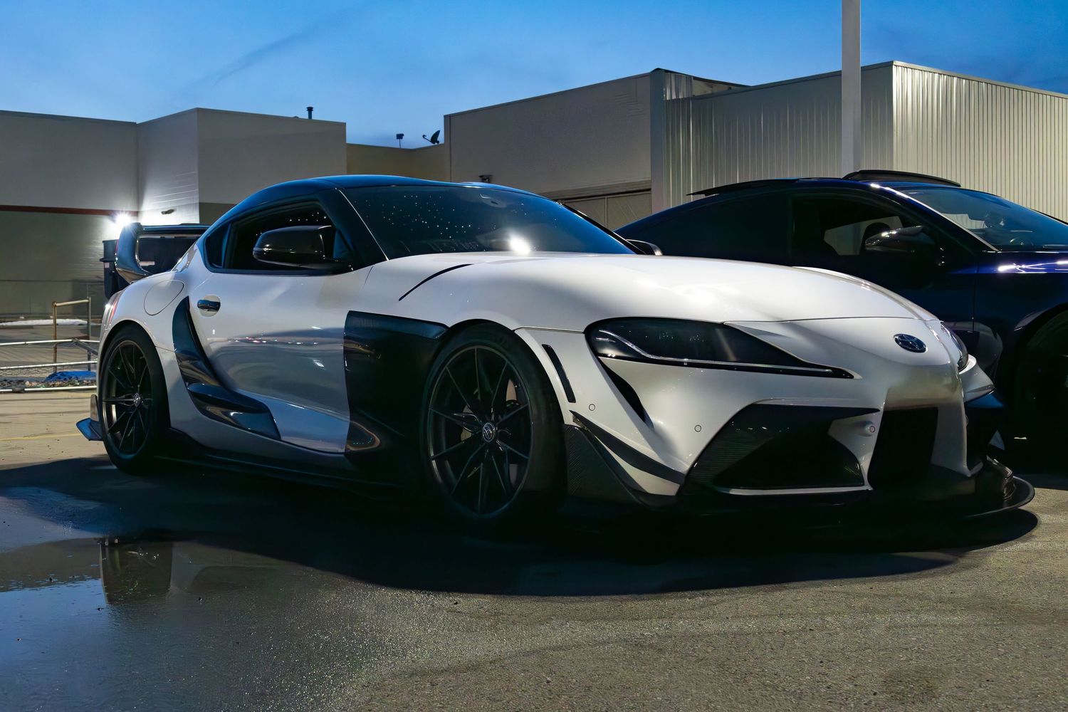 White and black Toyota Supra