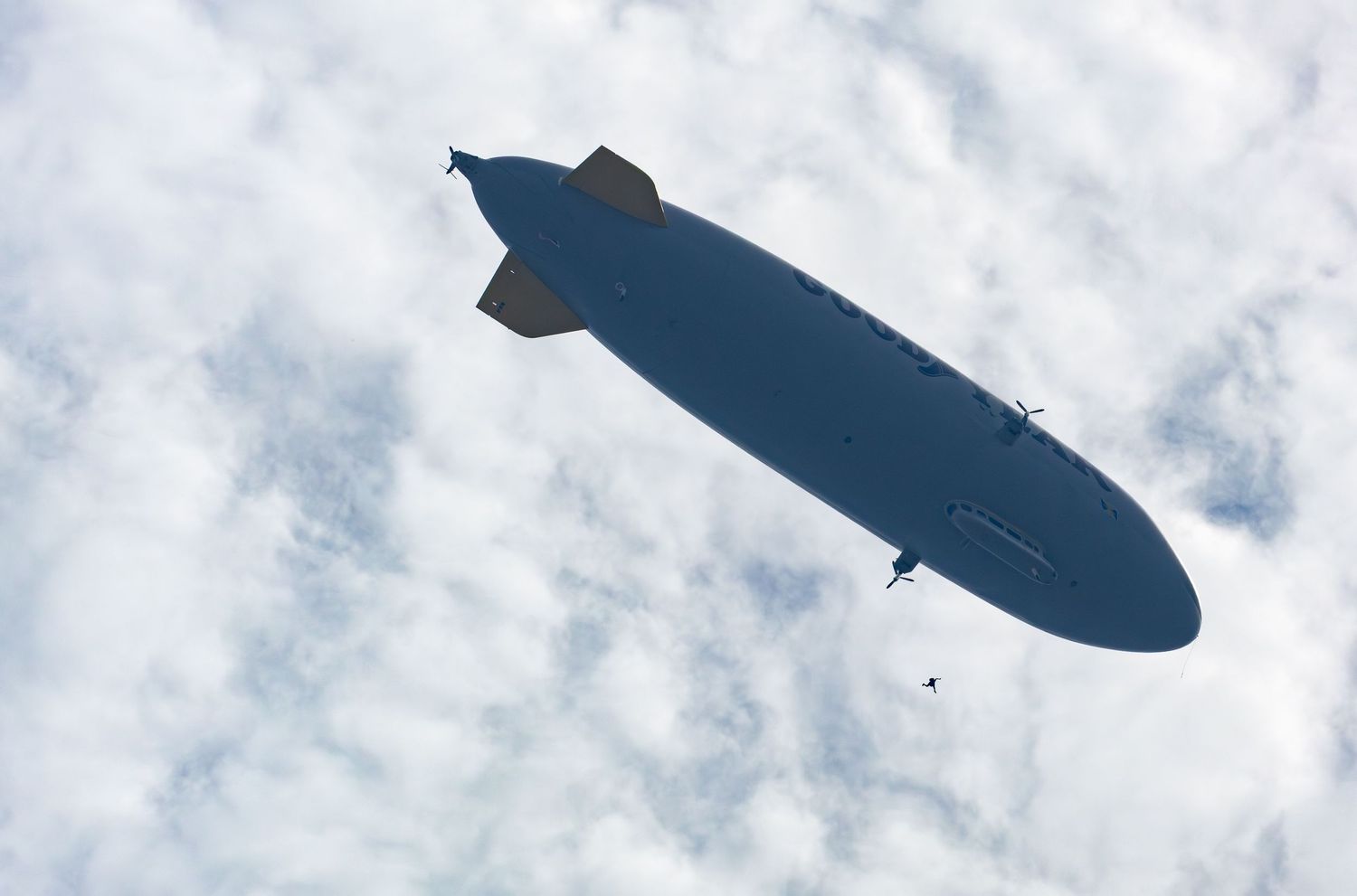 Skydiver jumping out of Goodyear blimp