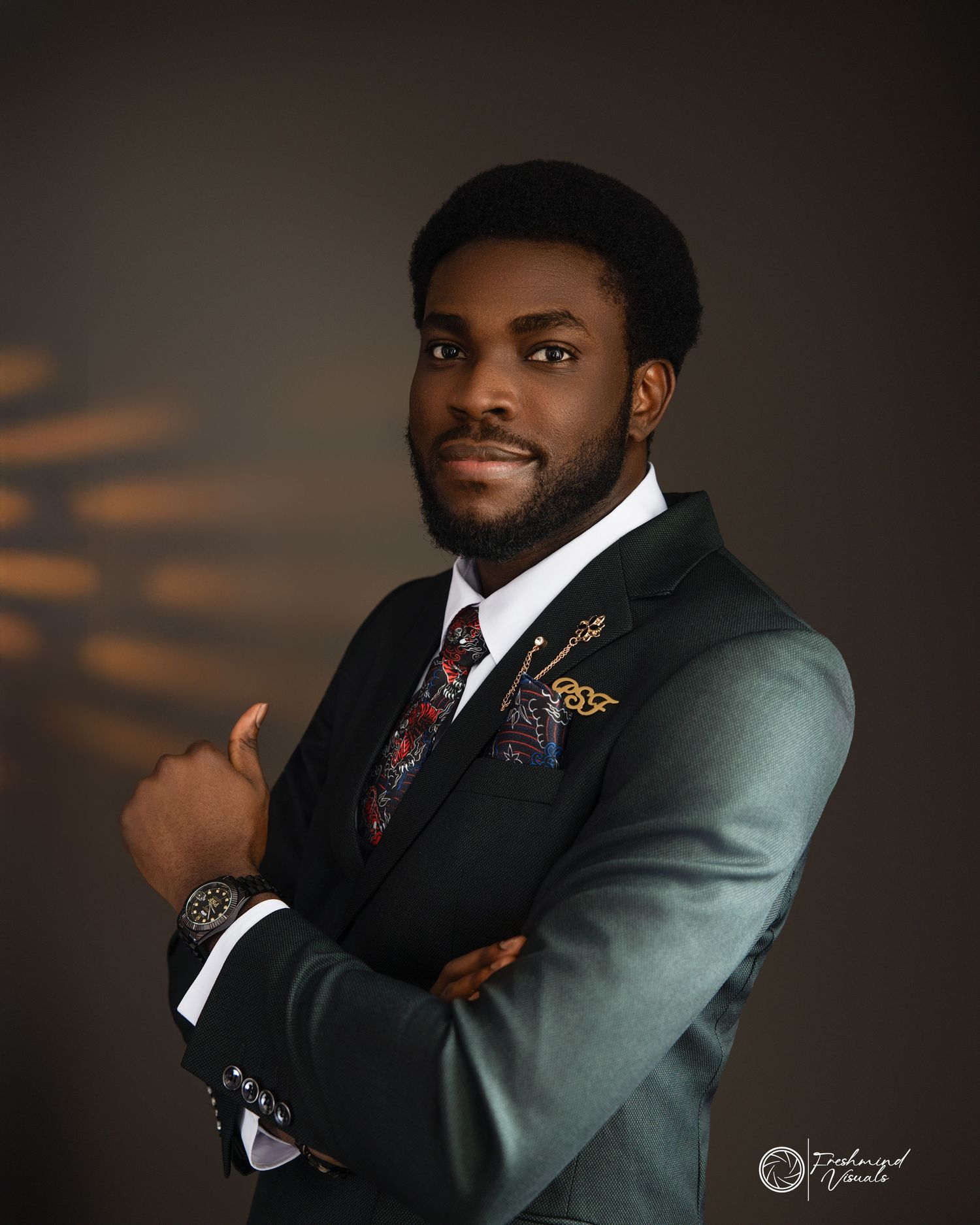 Business portrait series featuring sophisticated poses in formal attire with moody lighting.