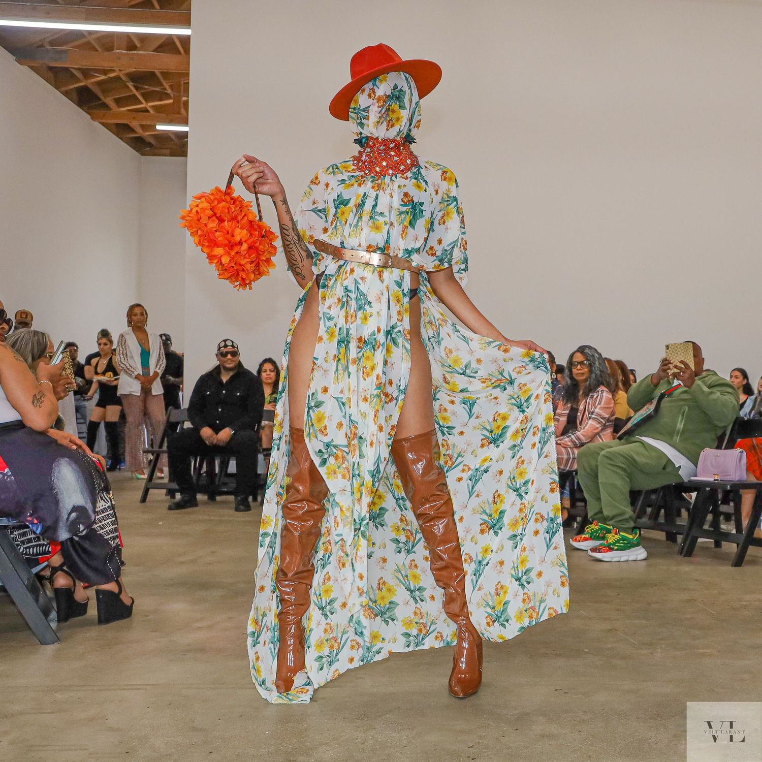 Fashion presentation showcases twirling floral dress with matching accessories.