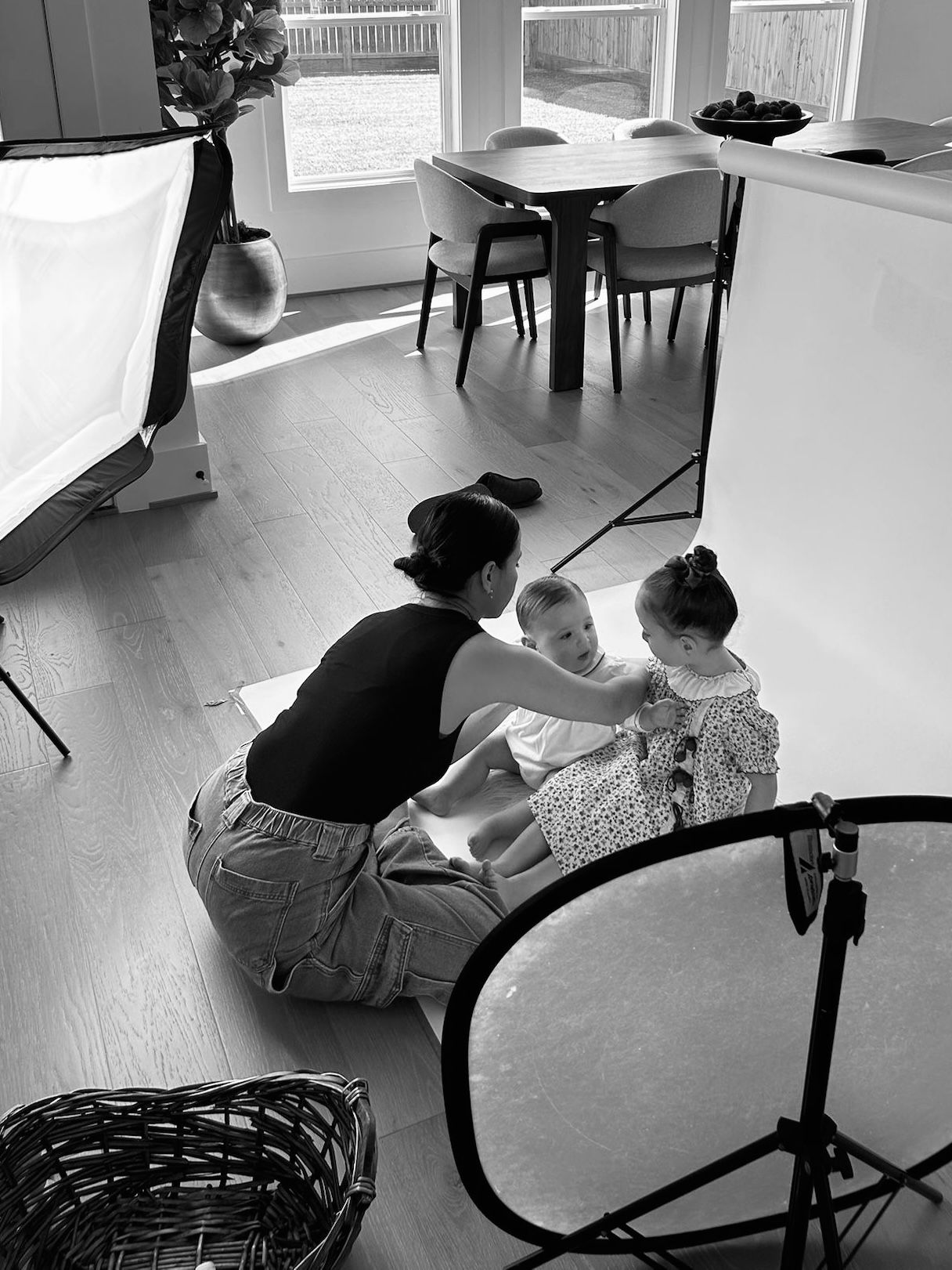 A series of black and white photos showing someone using an ergonomic kneeling chair at a desk workspace.