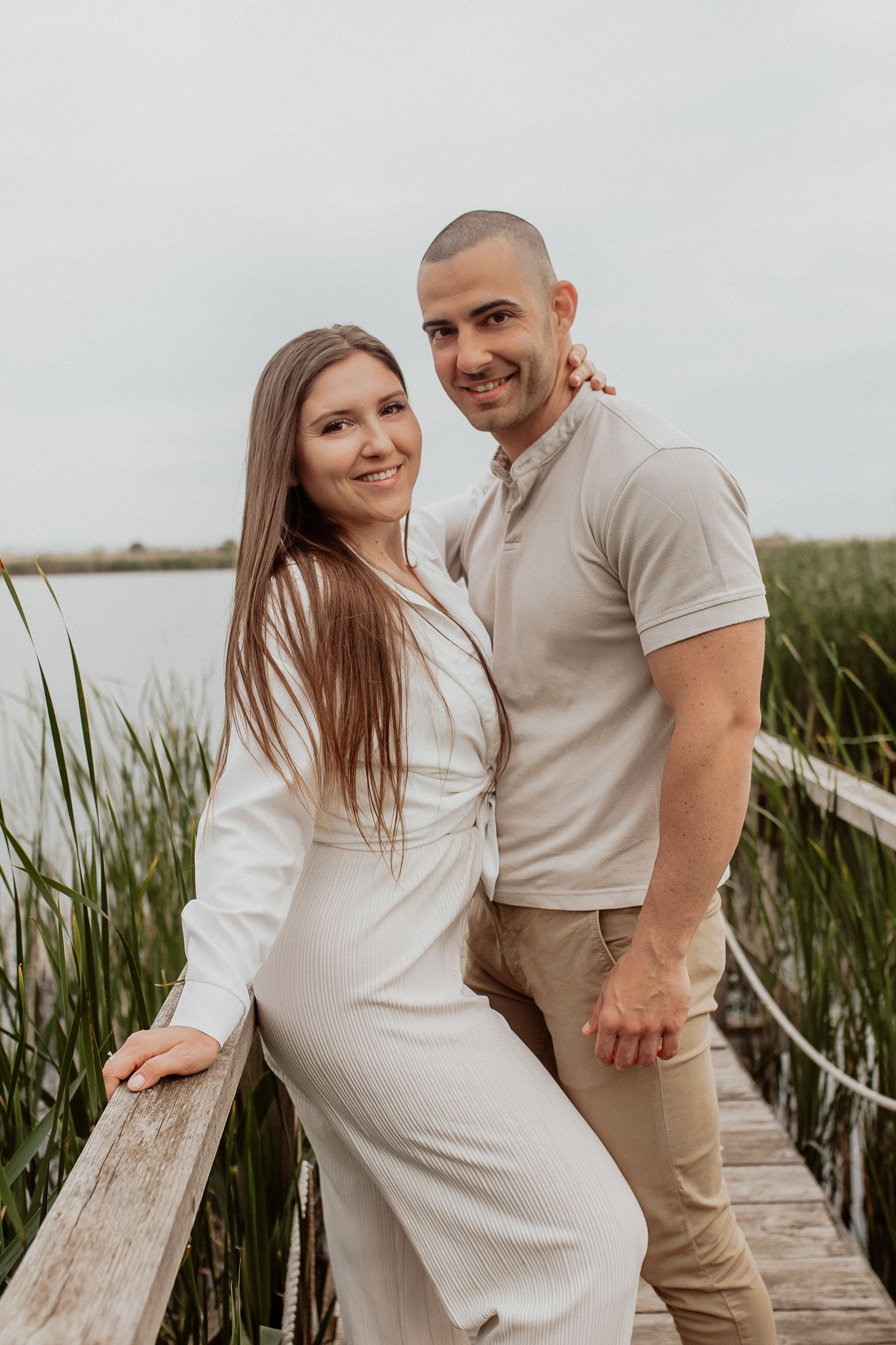 Relaxed couple portrait capturing genuine connection during a natural outdoor photoshoot
