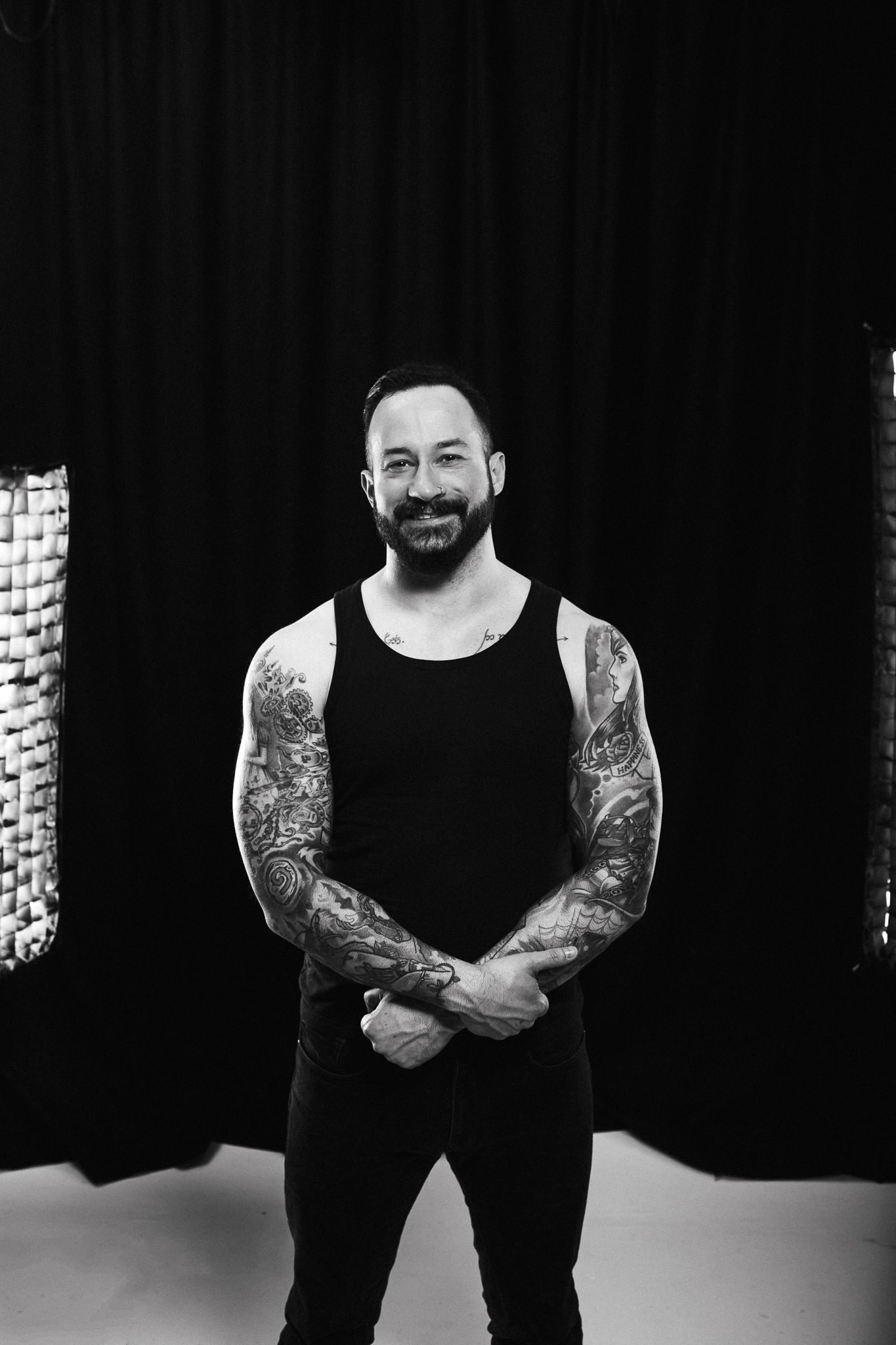 Natural lifestyle portrait of man in studio light, capturing authentic personality and emotion.