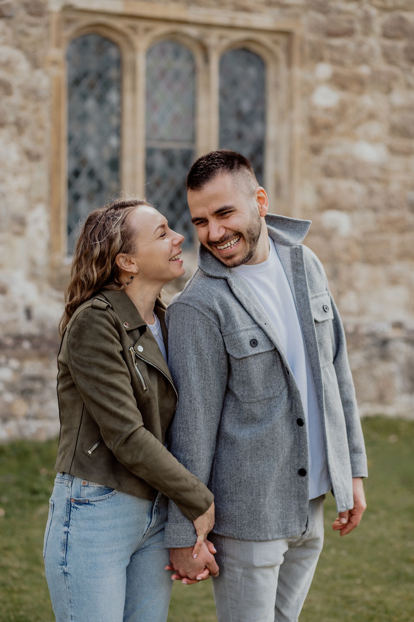 Relaxed couple portrait capturing genuine connection during a natural outdoor photoshoot