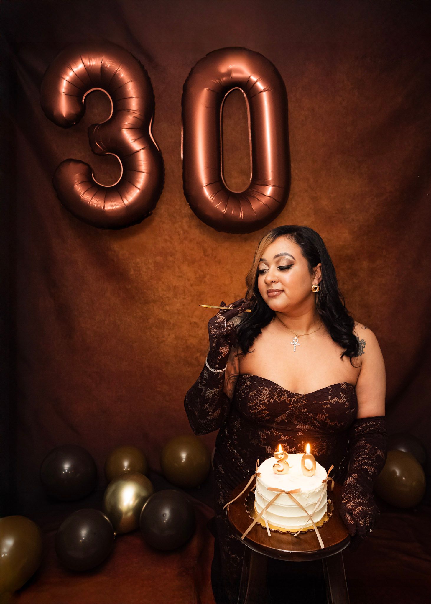 Birthday Photoshoot featuring 30th birthday photoshoot with rose gold balloons and a cake in warm lighting.