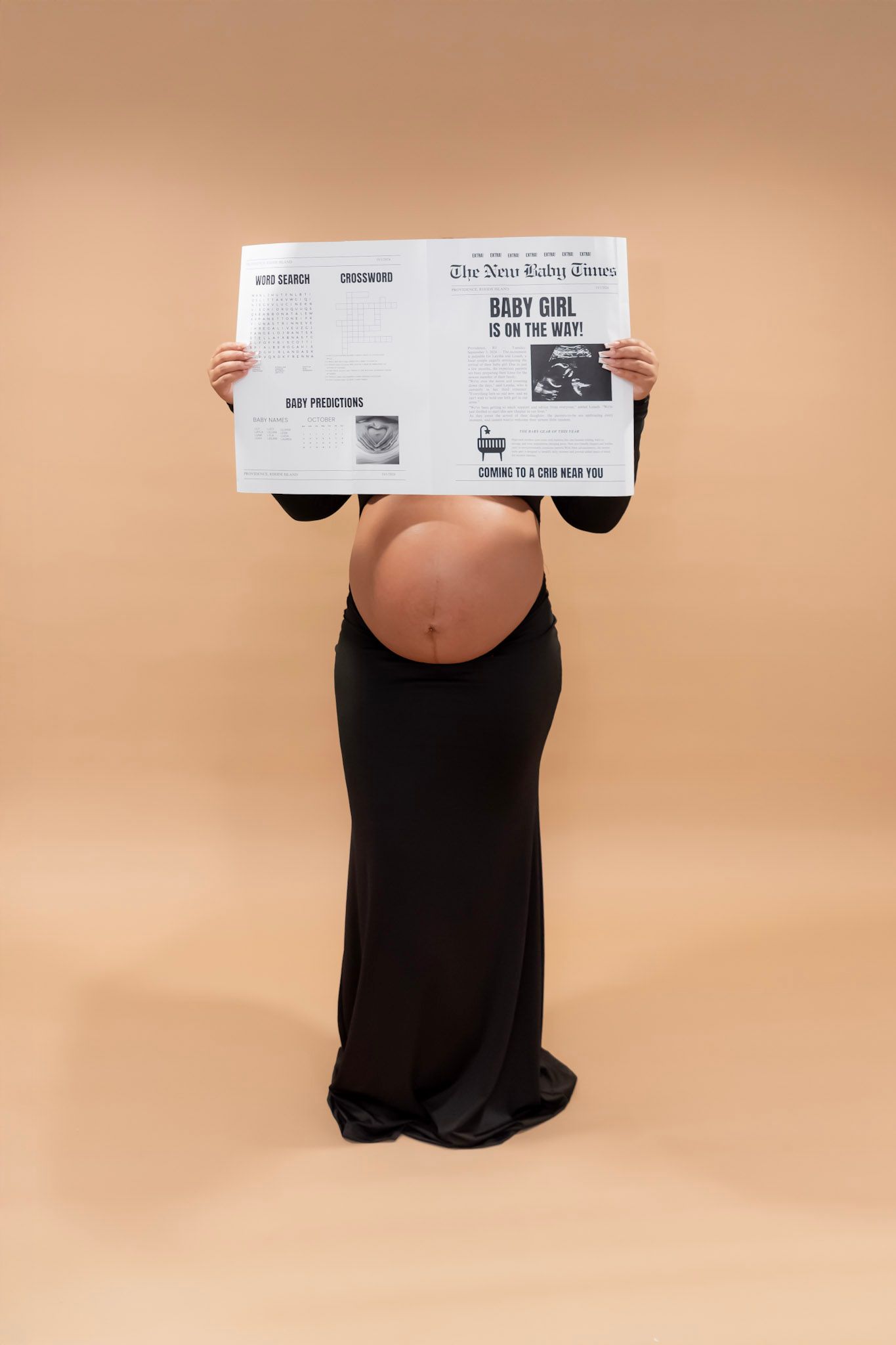 Maternity silhouette holding newspaper against beige background showing baby announcement.