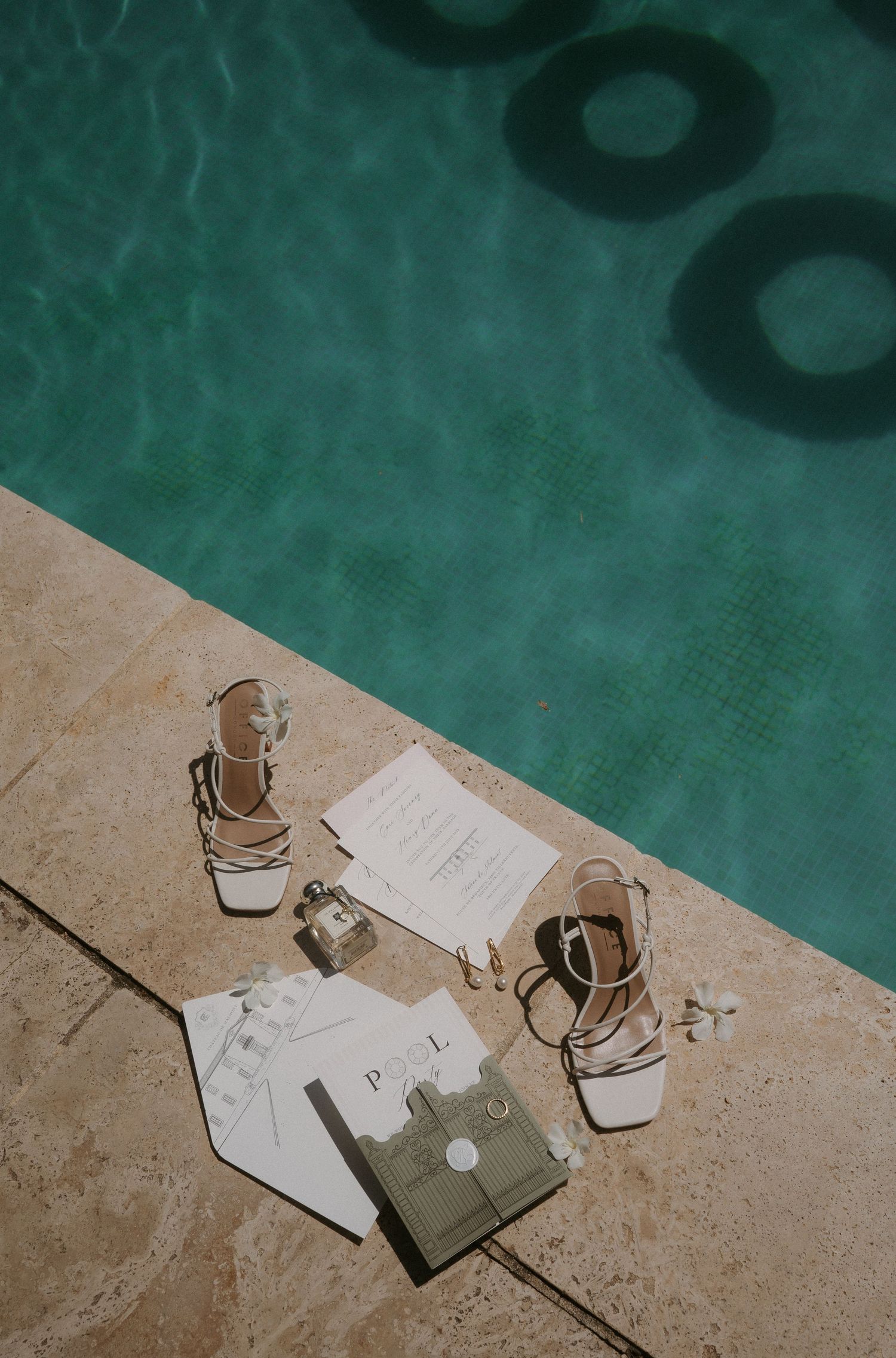 A sequence of four photos showing empty coffee cups and papers on a green surface with bokeh lighting effects.