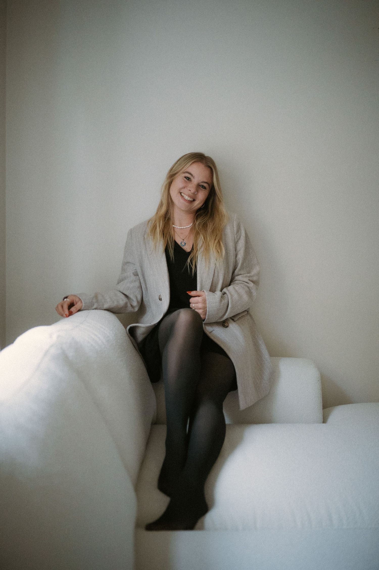 Casual lifestyle photos of someone lounging on white furniture.