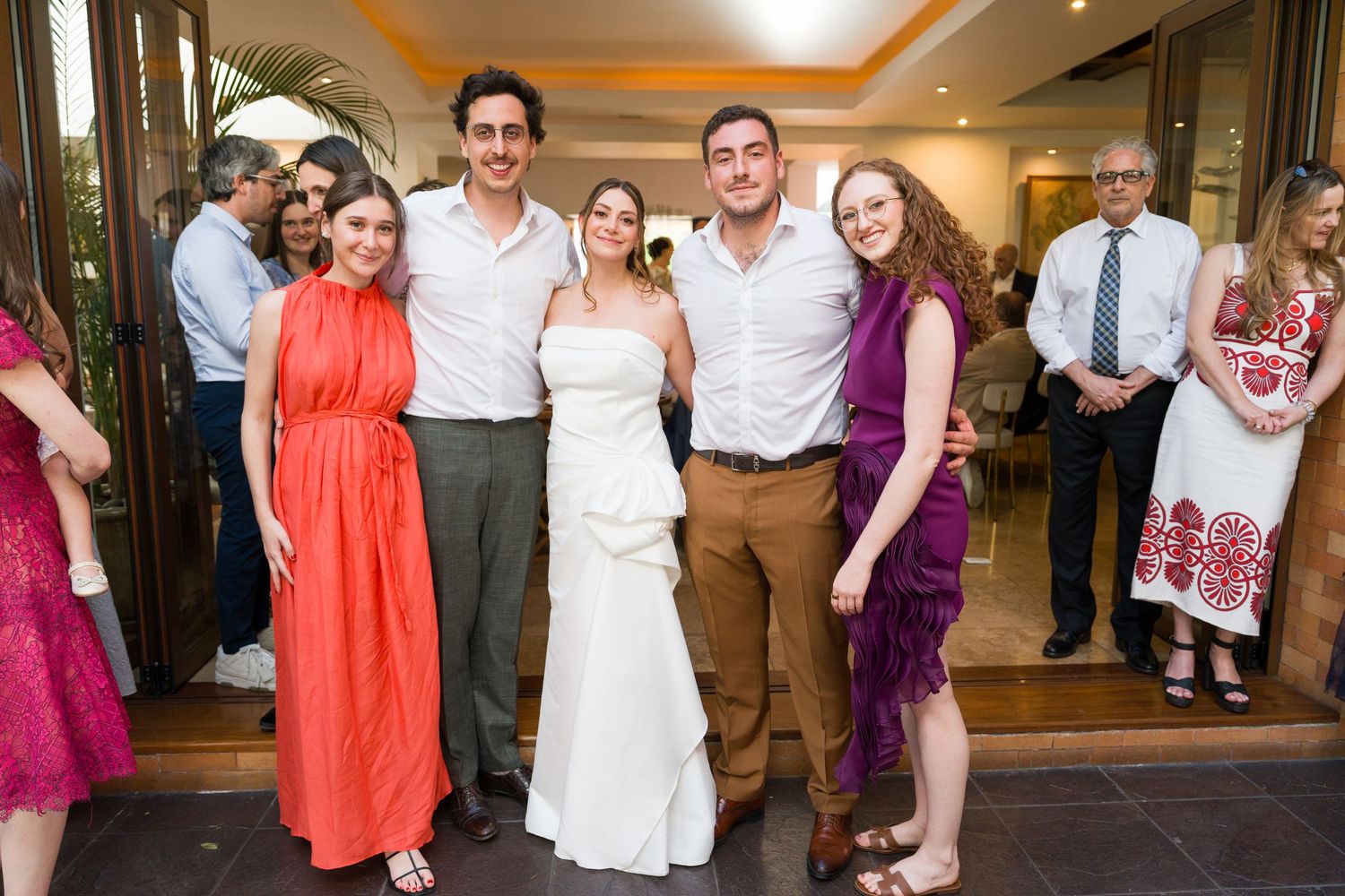 Wedding reception celebration with guests dancing and enjoying the festivities.