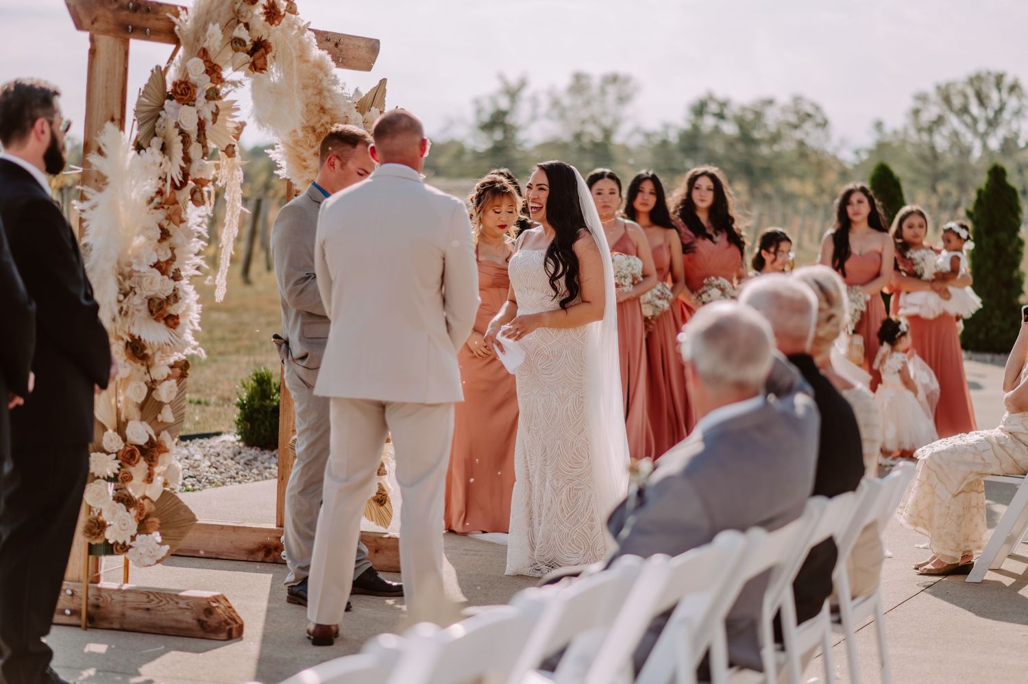 Outdoor wedding ceremony at Daniel's Vineyard in Indianapolis, Indiana. Indianapolis wedding photographer