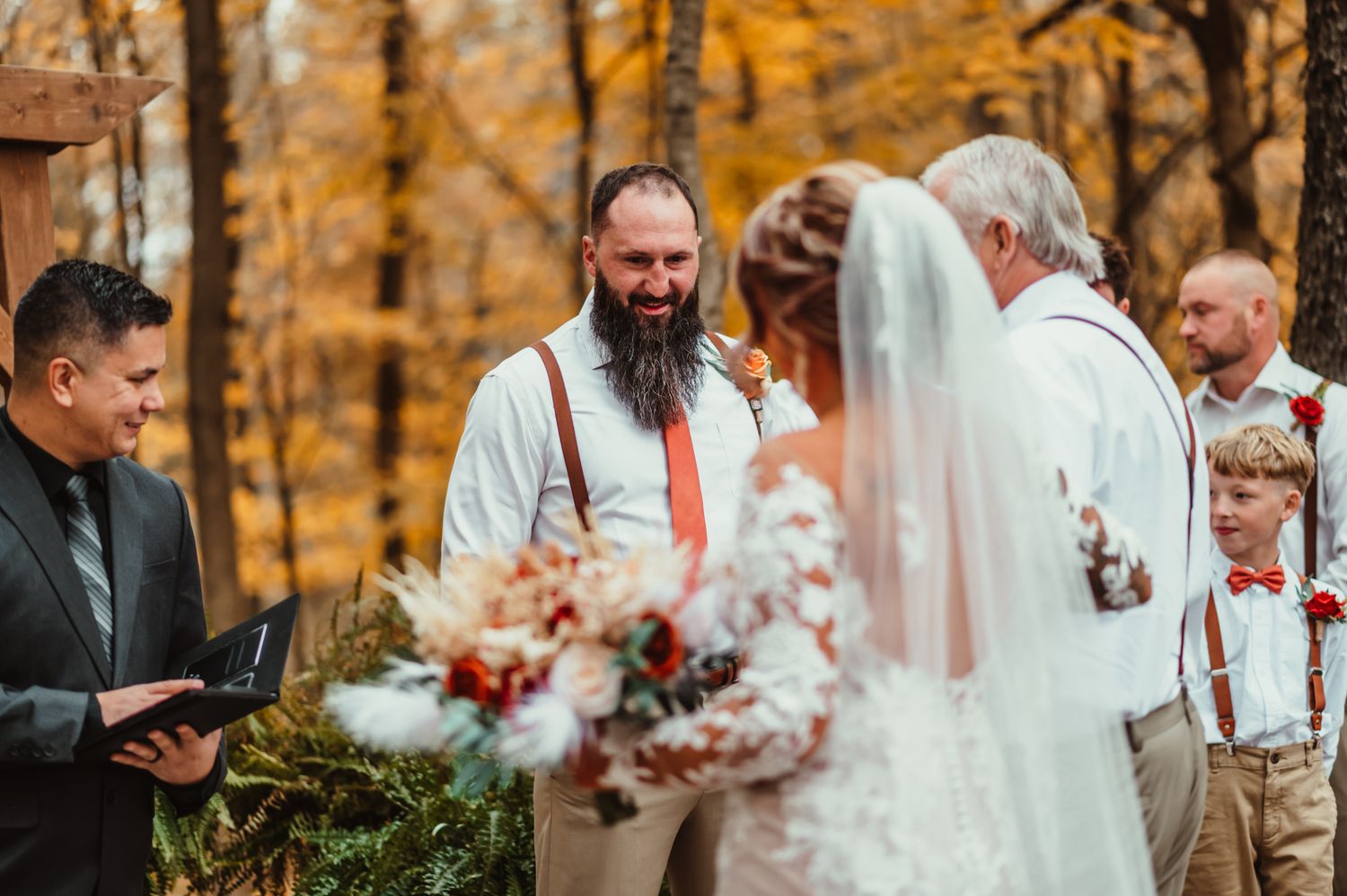 White Pine Manor wedding ceremony photo of groom watching bride walk down the aisle. Indianapolis wedding photographer