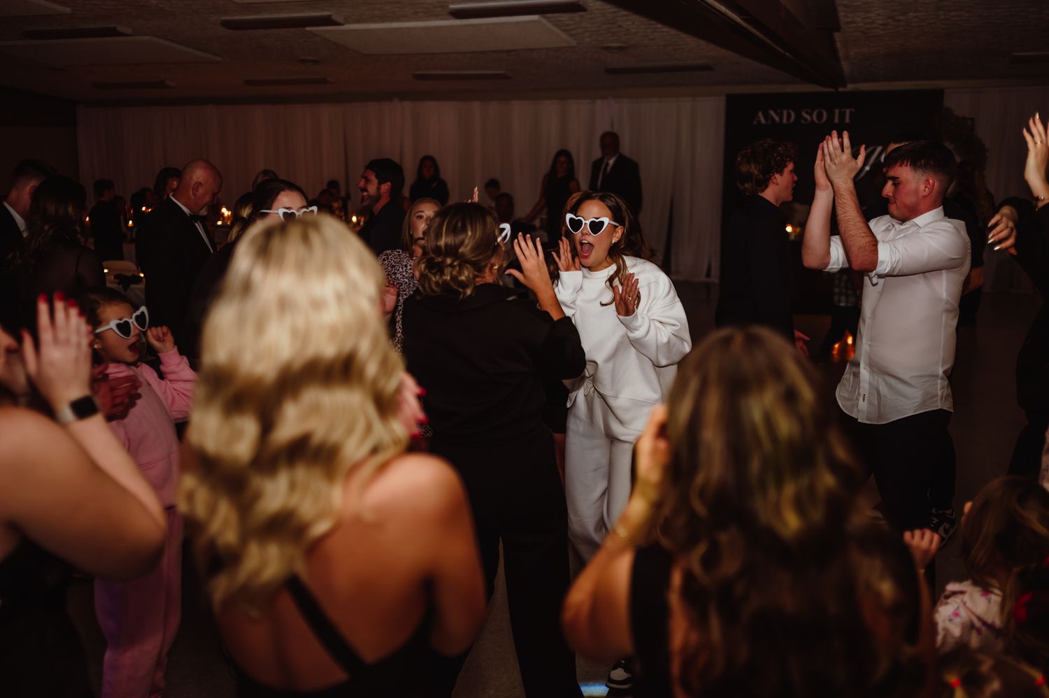 Bride dancing at wedding reception in Washington, Indiana. Indianapolis wedding photographer
