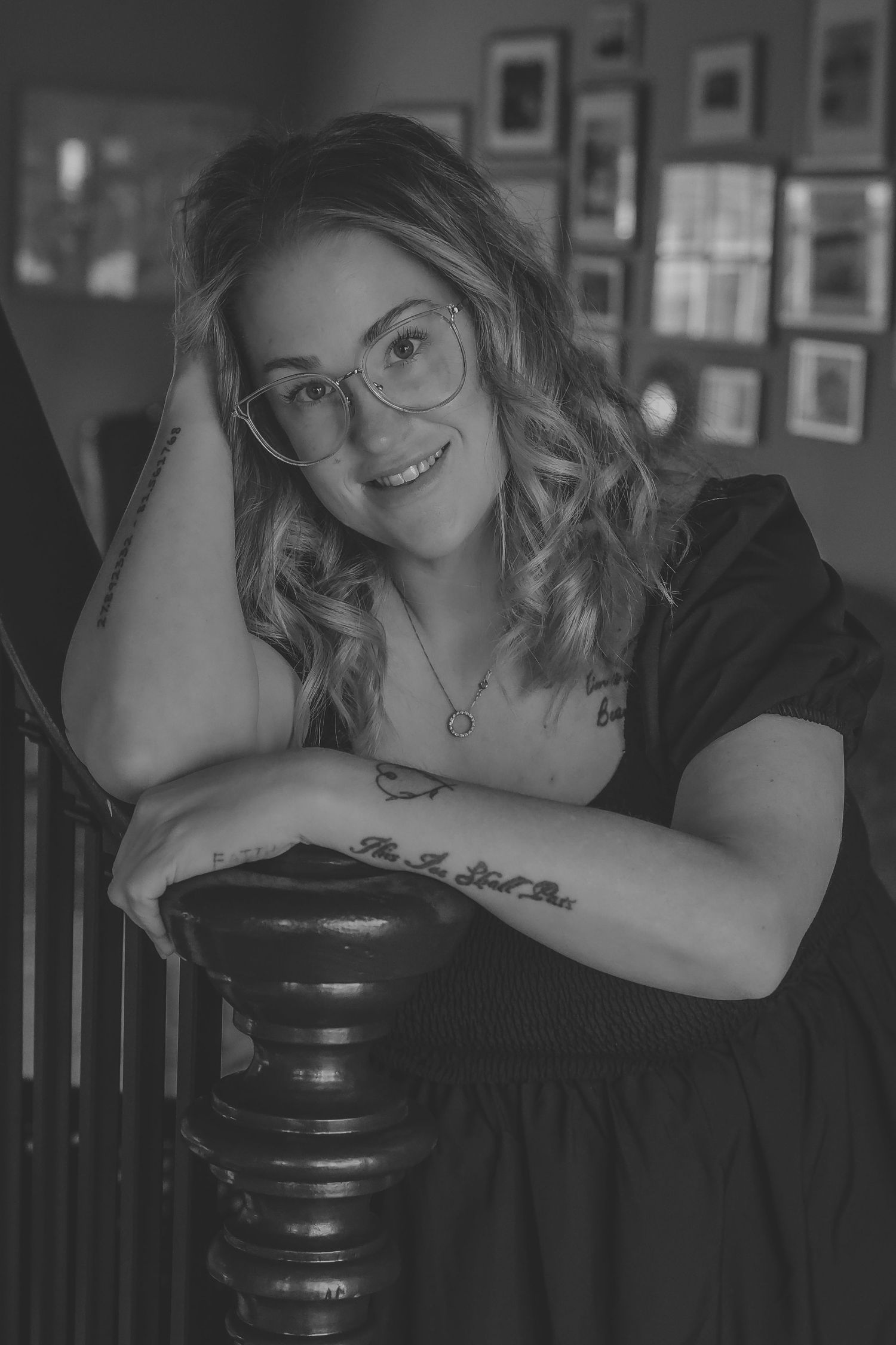 Woman smiling during a lifestyle portrait session with natural light. In kingston, tn
