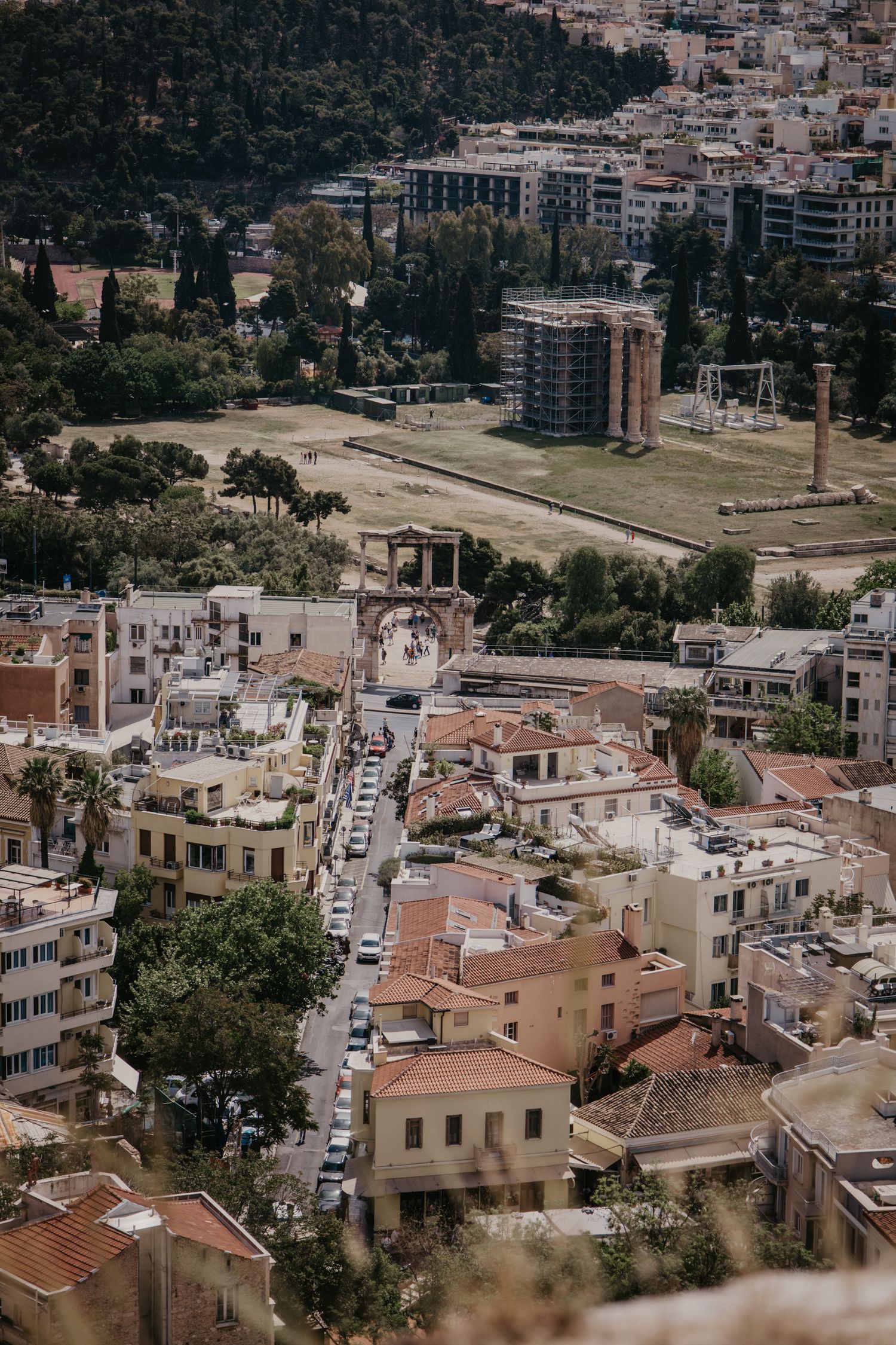 Aerial view of residential neighborhoods and modern buildings in Athens, Greece.