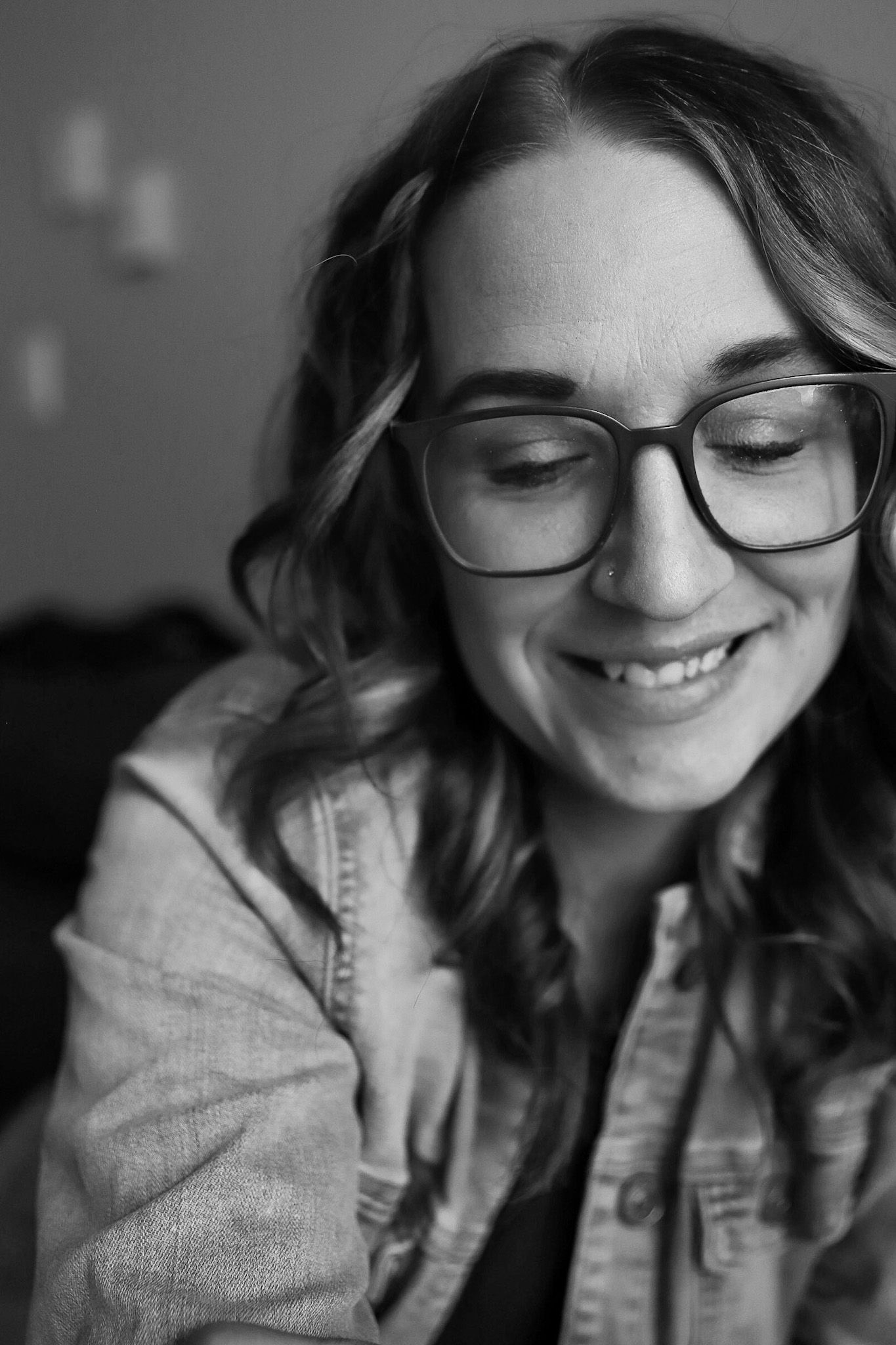 Black and white portrait series showing genuine smiles and laughter.
