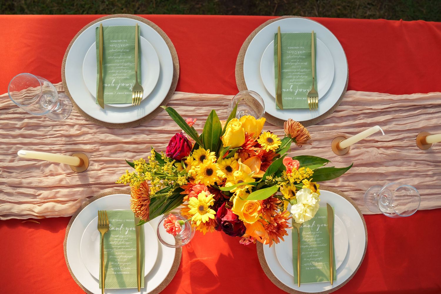 Top view of a wedding reception table setting at Four Seasons Oahu. Tropical decor and floral arrangements in Ko Olina.
