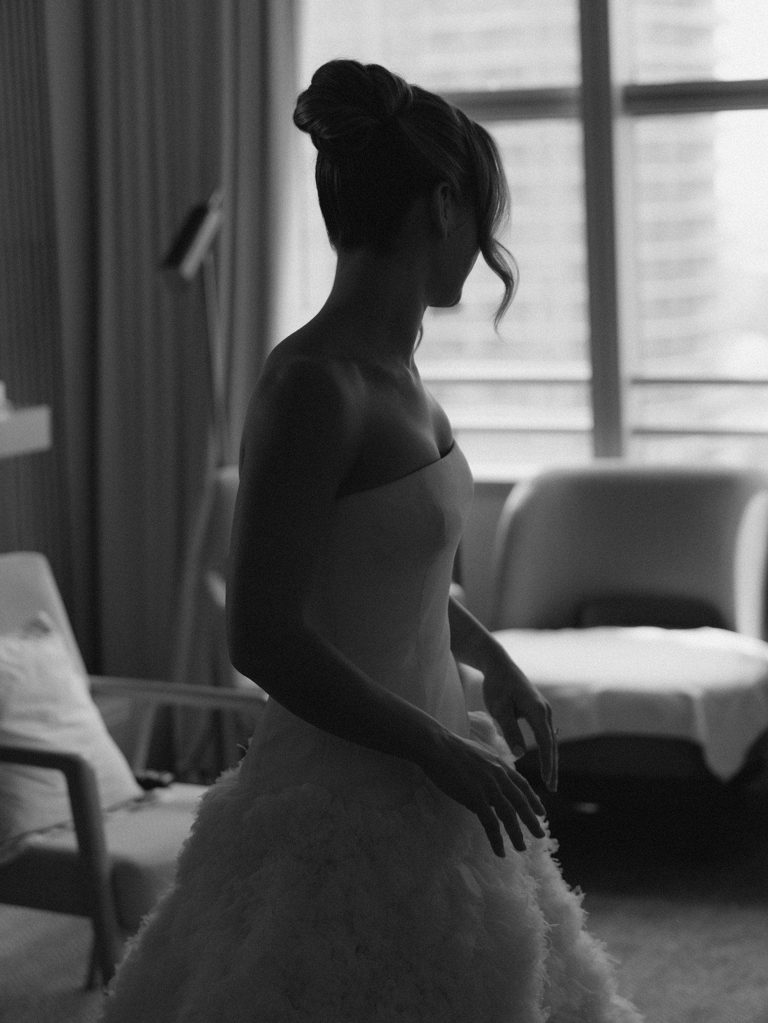 A black and white artistic photo series showing a ballet dancer in a tulle dress posing gracefully in different positions.