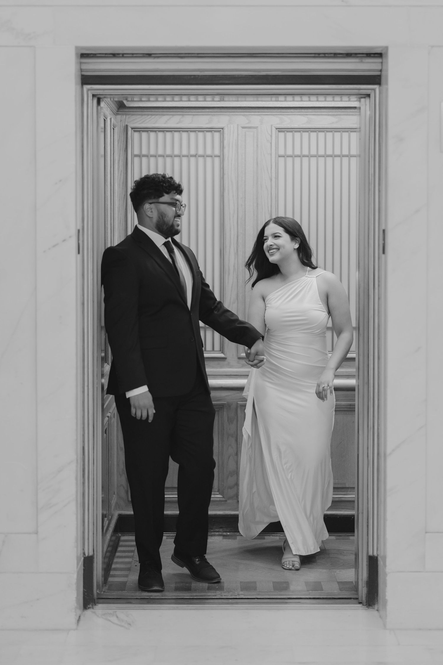 Romantic couple portrait at San Francisco City Hall dome interior