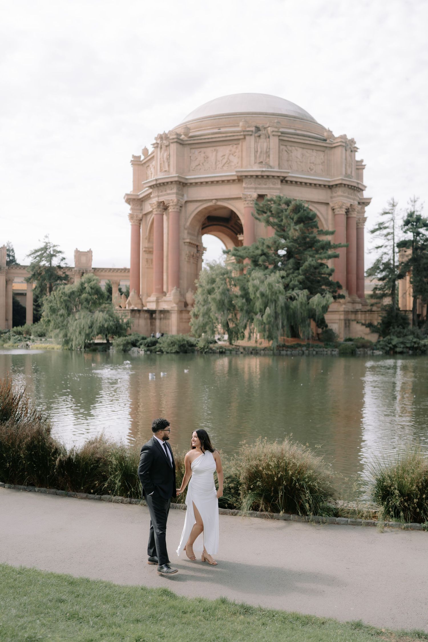 Romantic couple portrait at San Francisco City Hall dome interior