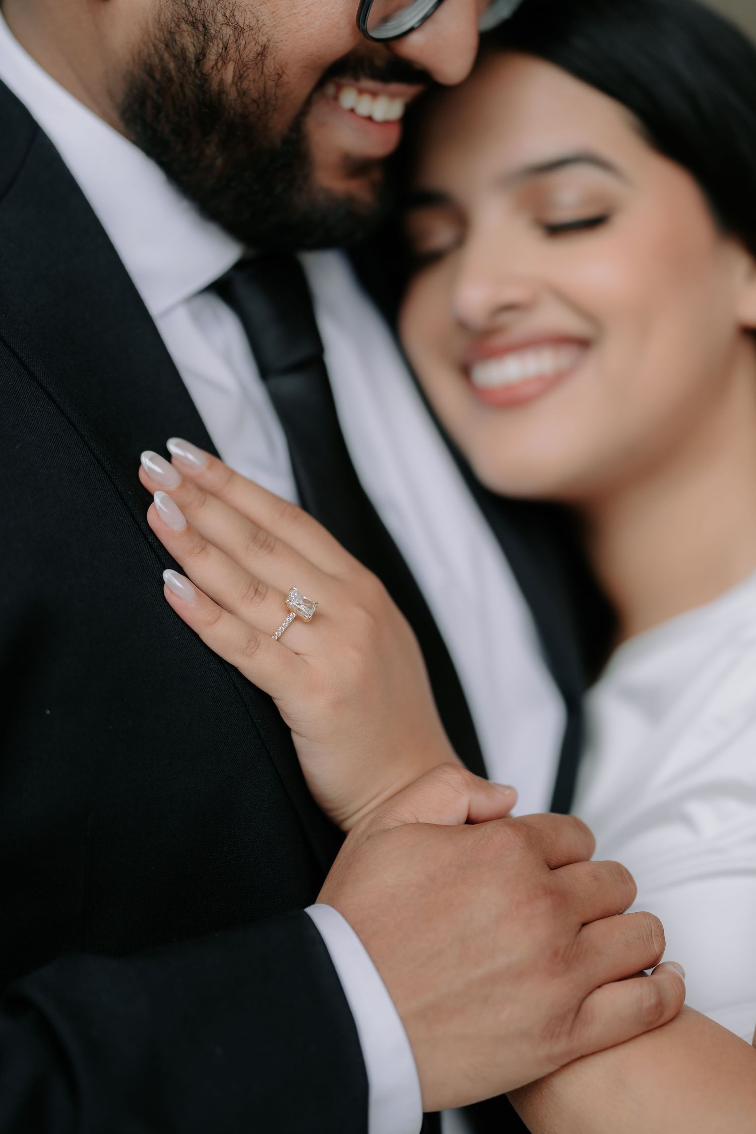 Romantic couple portrait at San Francisco City Hall dome interior