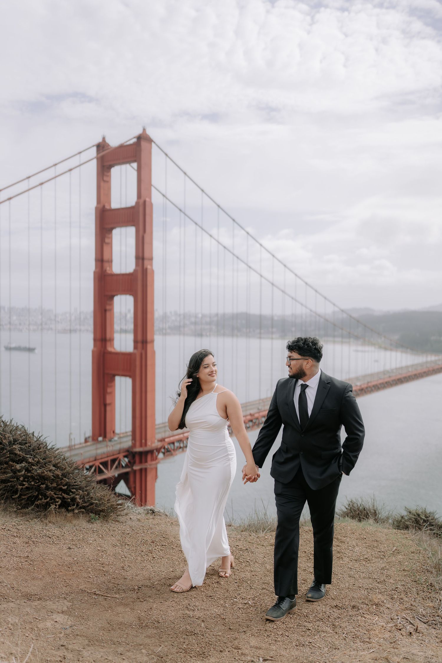 Romantic couple portrait at San Francisco City Hall dome interior