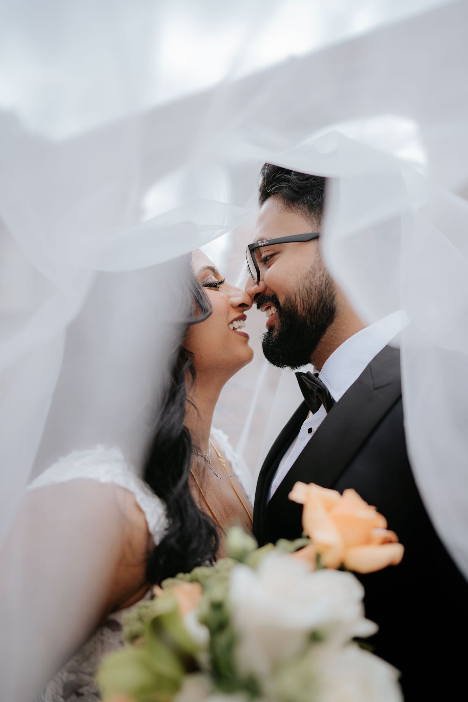 Bride and groom captured during a South Indian Catholic wedding ceremony in Antigua, Guatemala