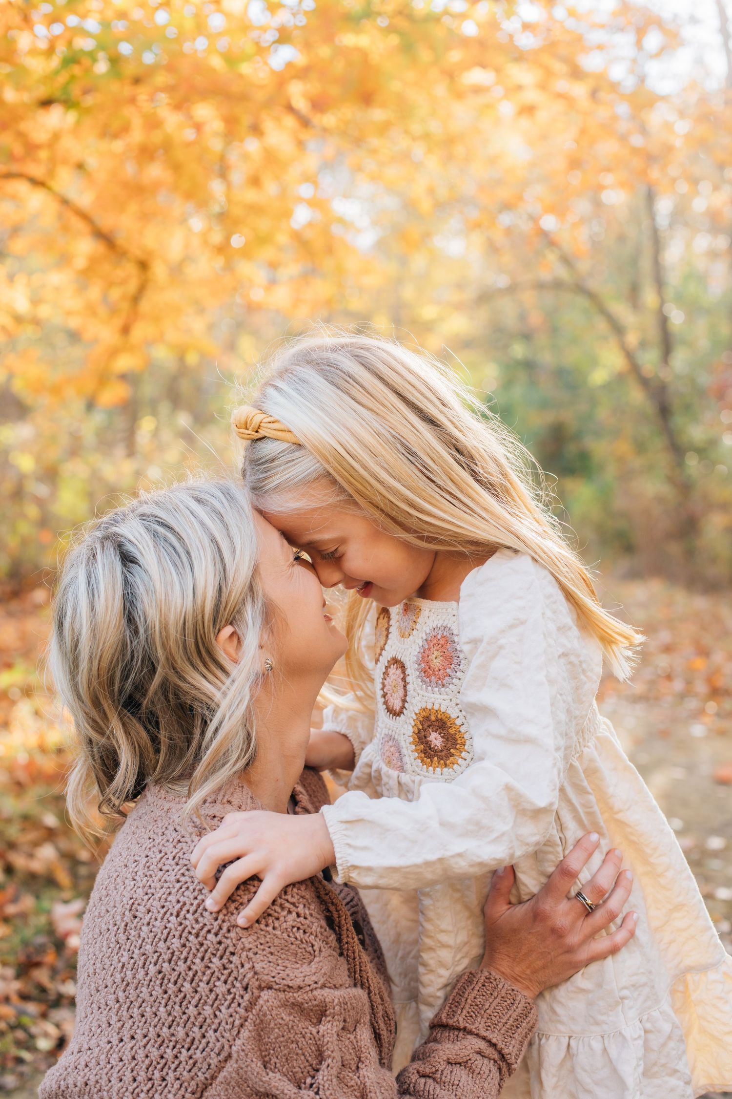 Joyful family photo in golden hour light at Menomonee Park, Menomonee Falls