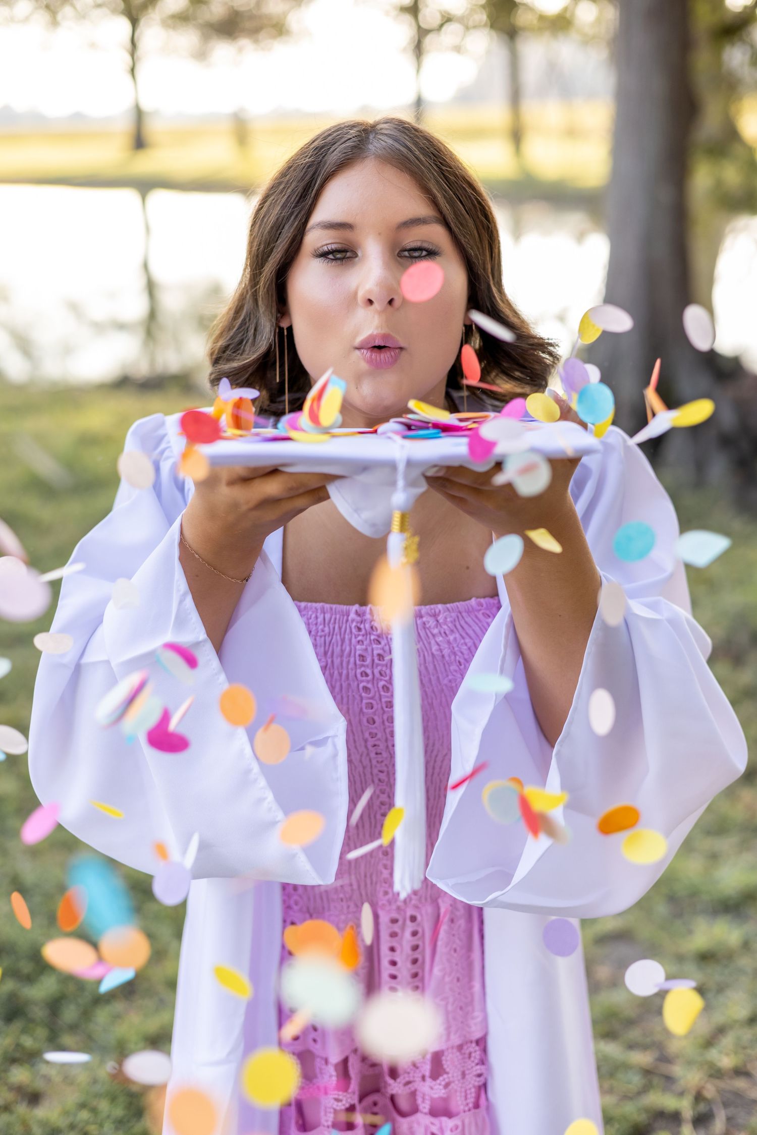Cap and gown senior session graduation class of 2026 class of 2027 2028 2029 2030 confetti celebration photography photographer
