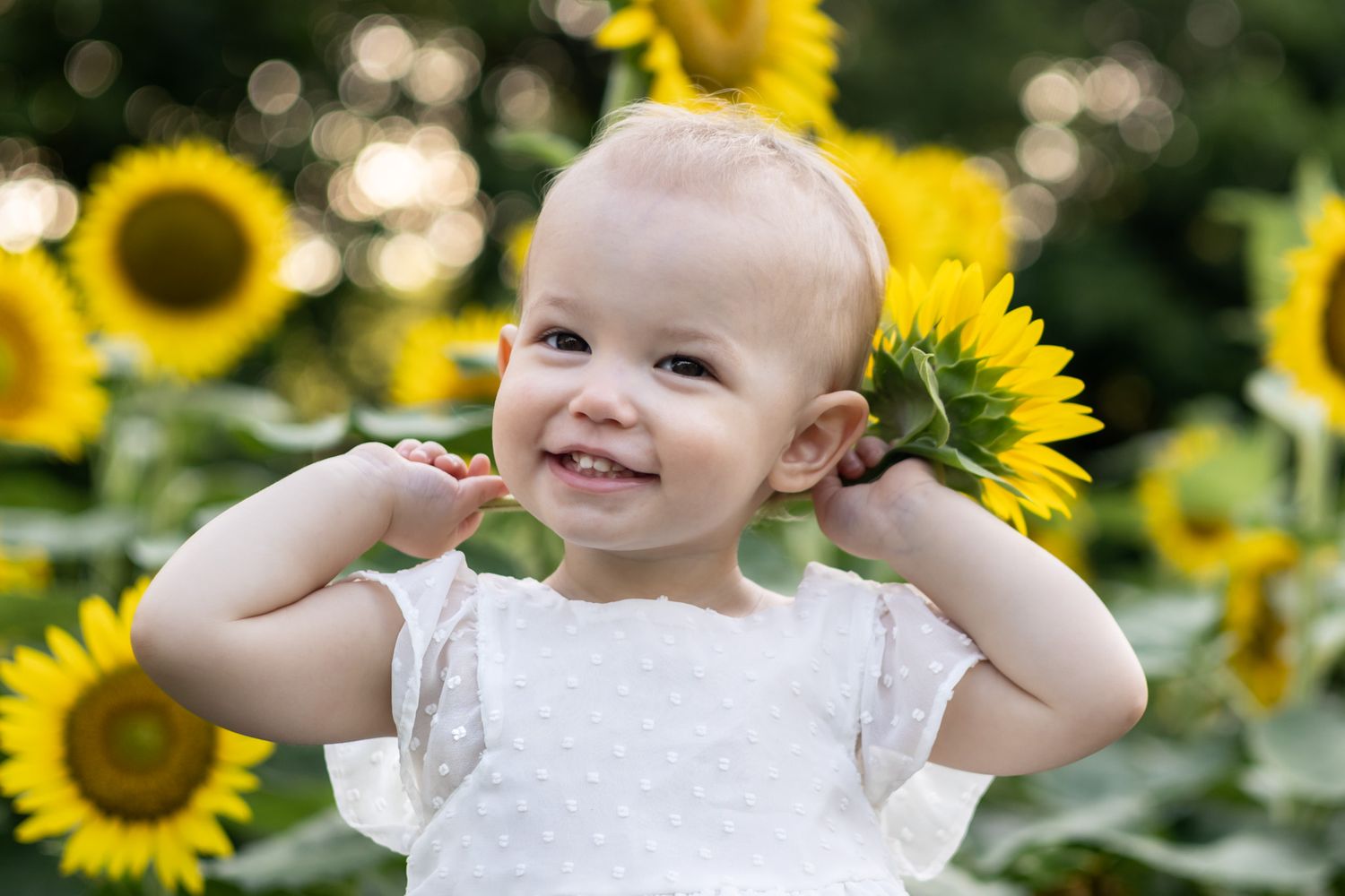 Family Session photographer photography Cleveland Mississippi Sunflower Field floral children