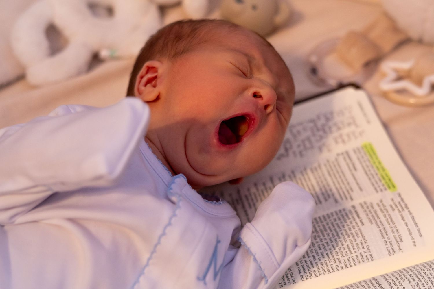 In home Newborn session photography in Greenville Mississippi Bible