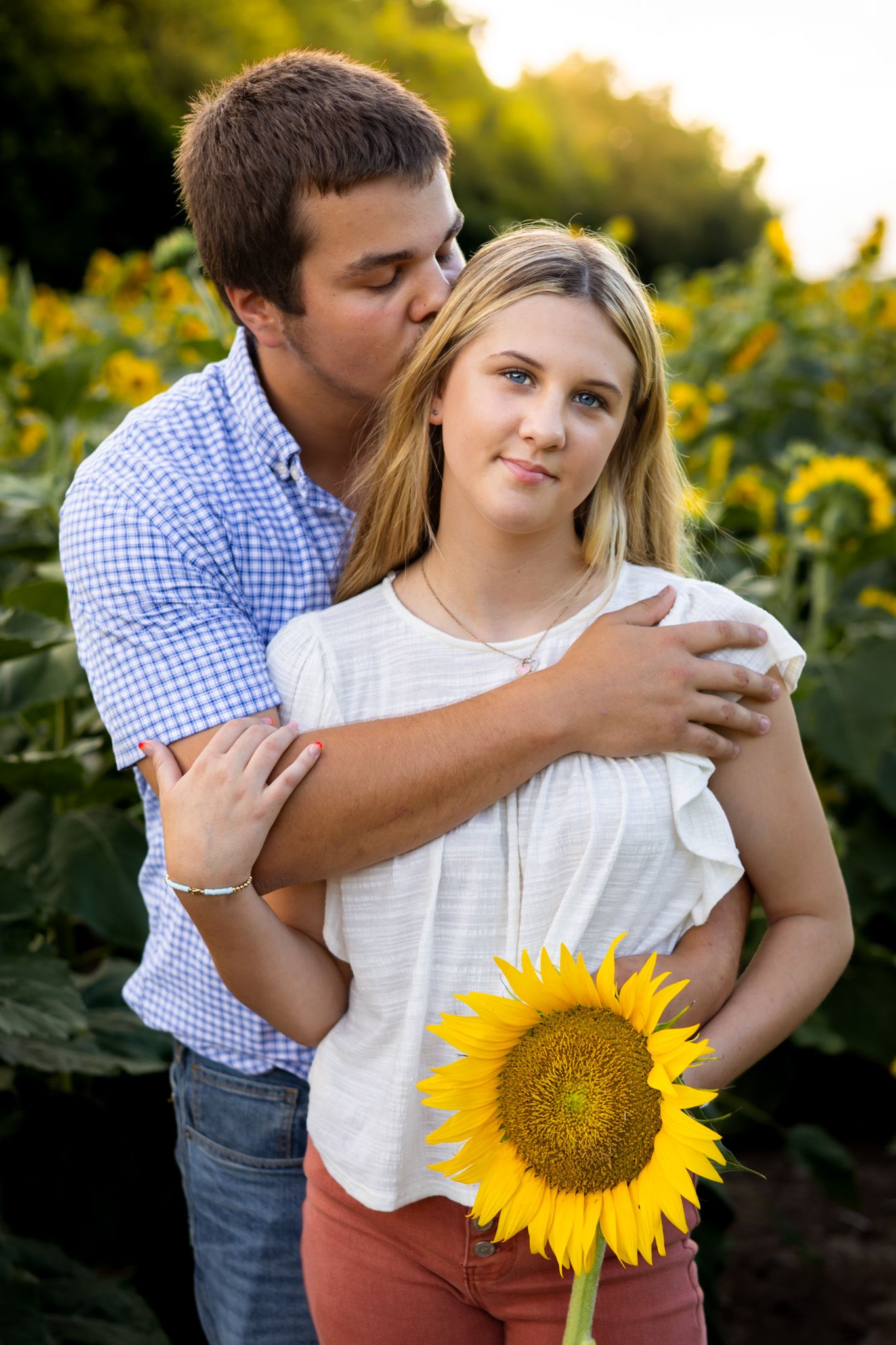 Couple Session photographer photography Cleveland Mississippi Sunflower Field floral