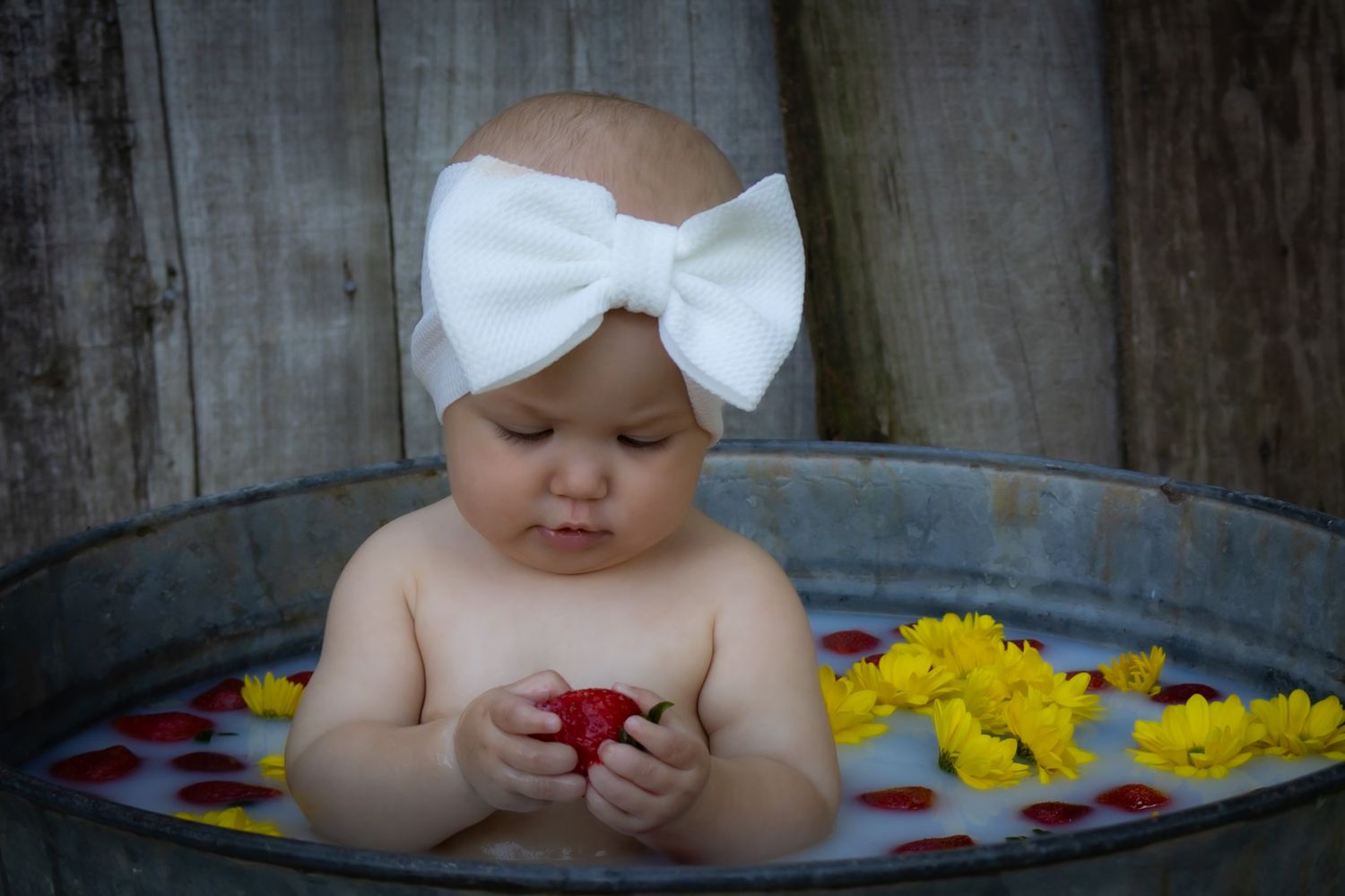 Children Baby Session photography photographer Cleveland Mississippi Baby in tub milk bath