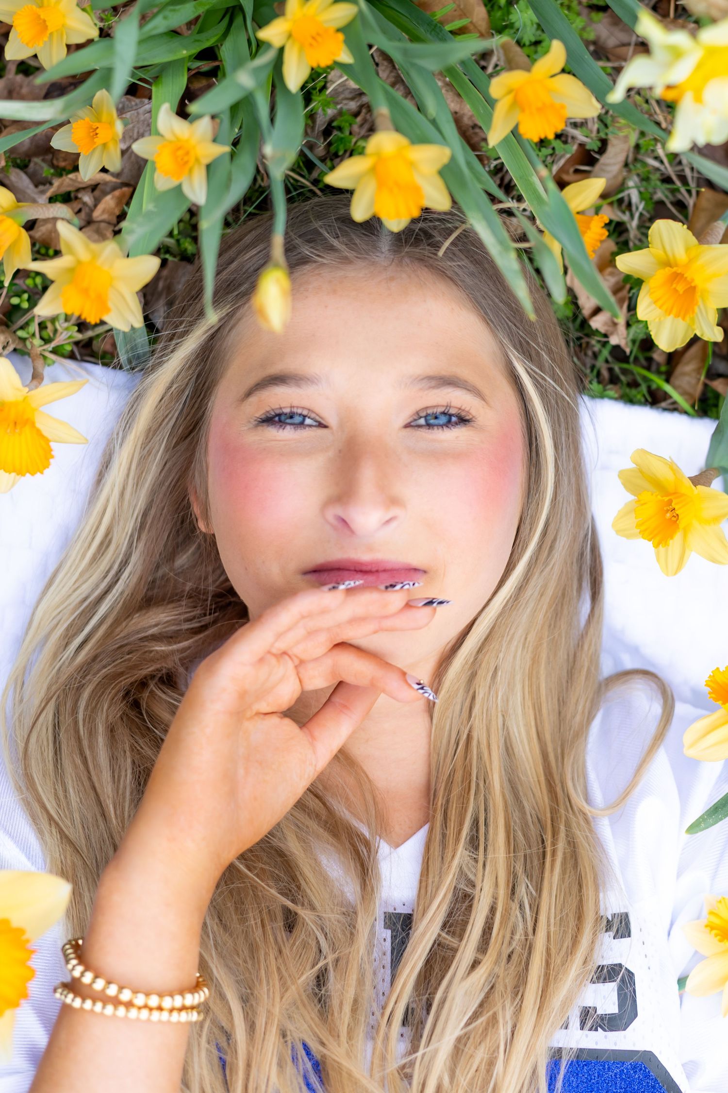 High School Senior portrait photography Cleveland Mississippi  flower field spring