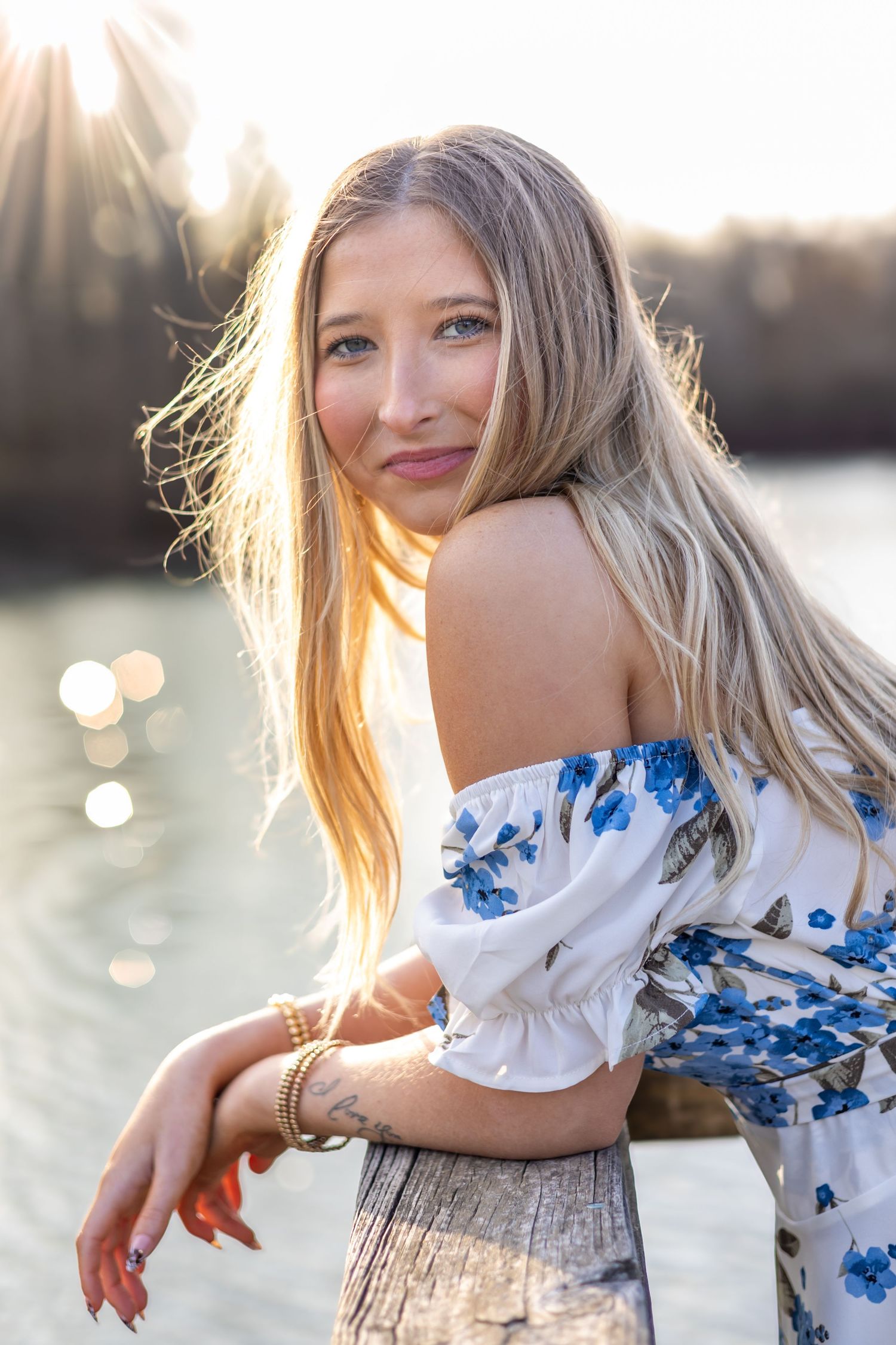 High School Senior portrait photography Cleveland Mississippi dock sunset