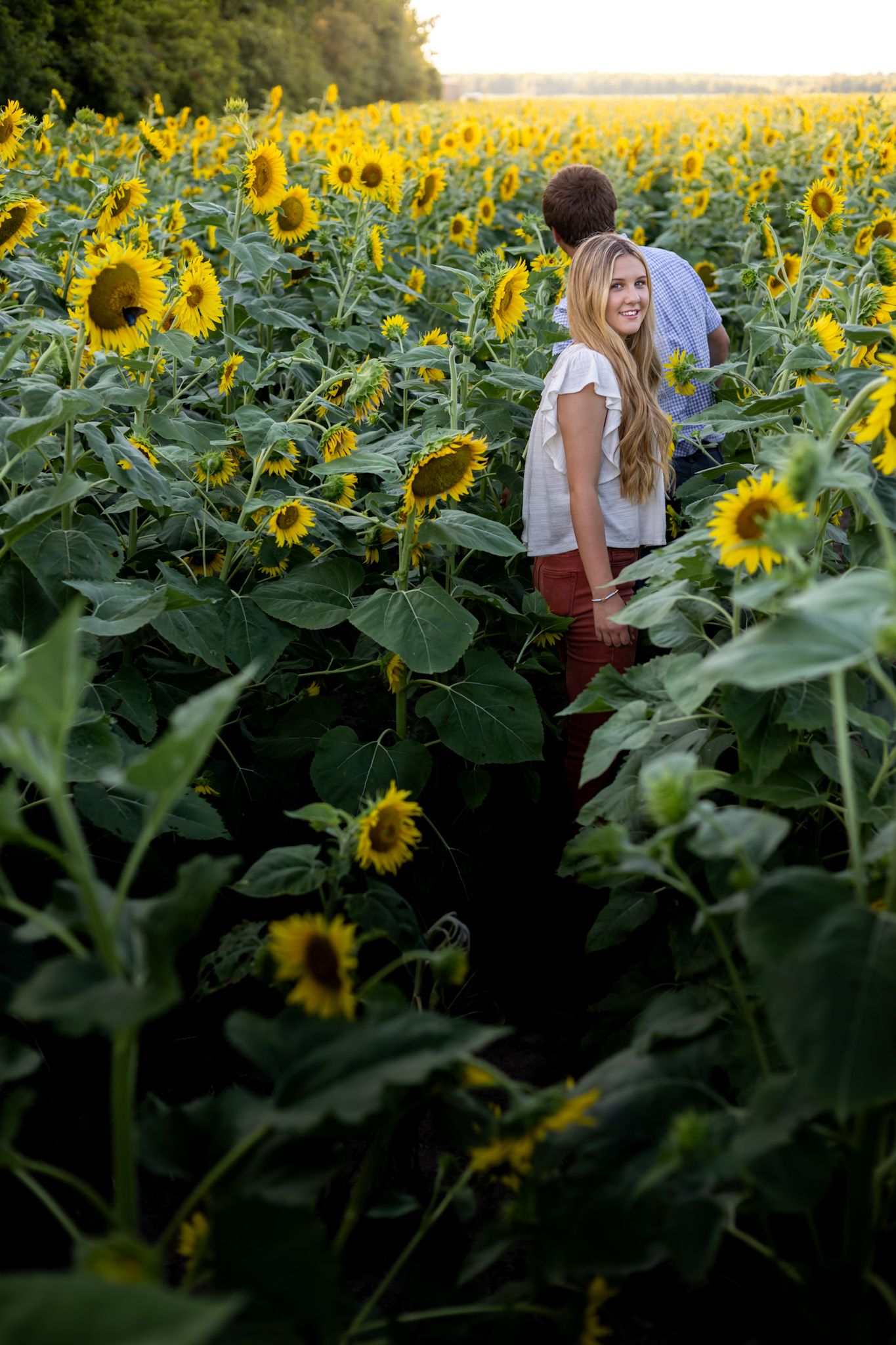 Family Session photographer photography Cleveland Mississippi Sunflower Field floral couple engagement session