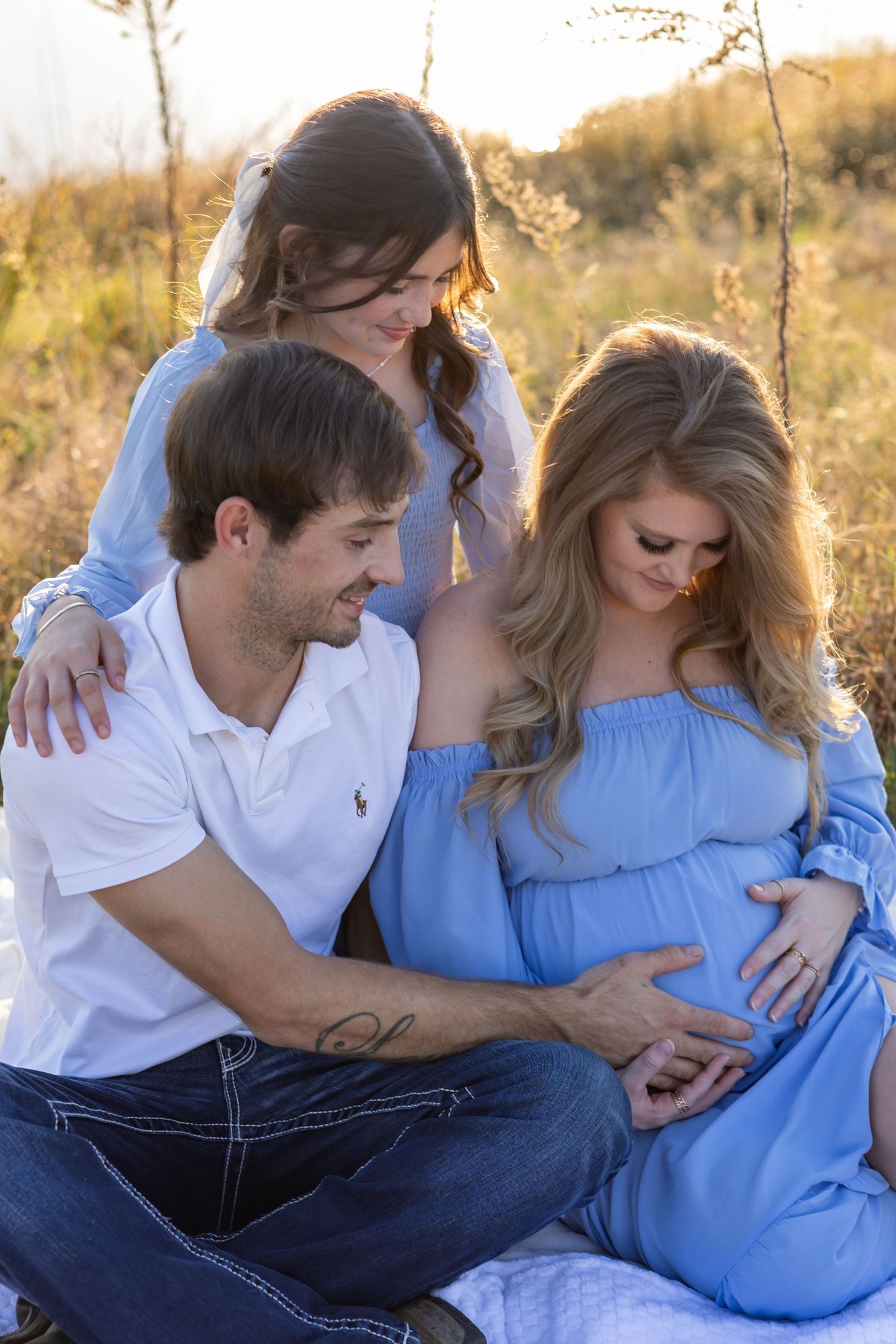 Maternity Session golden hour sunset in Cleveland, MS open field expecting moms photography photographer