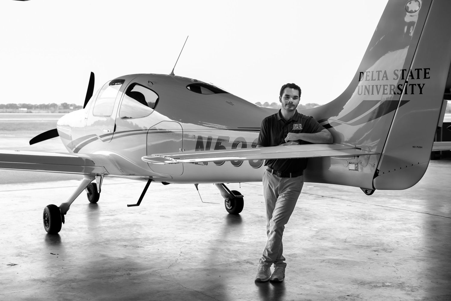 Airport Hanger photography photographer Cleveland, MS guy with airplane aircraft photos