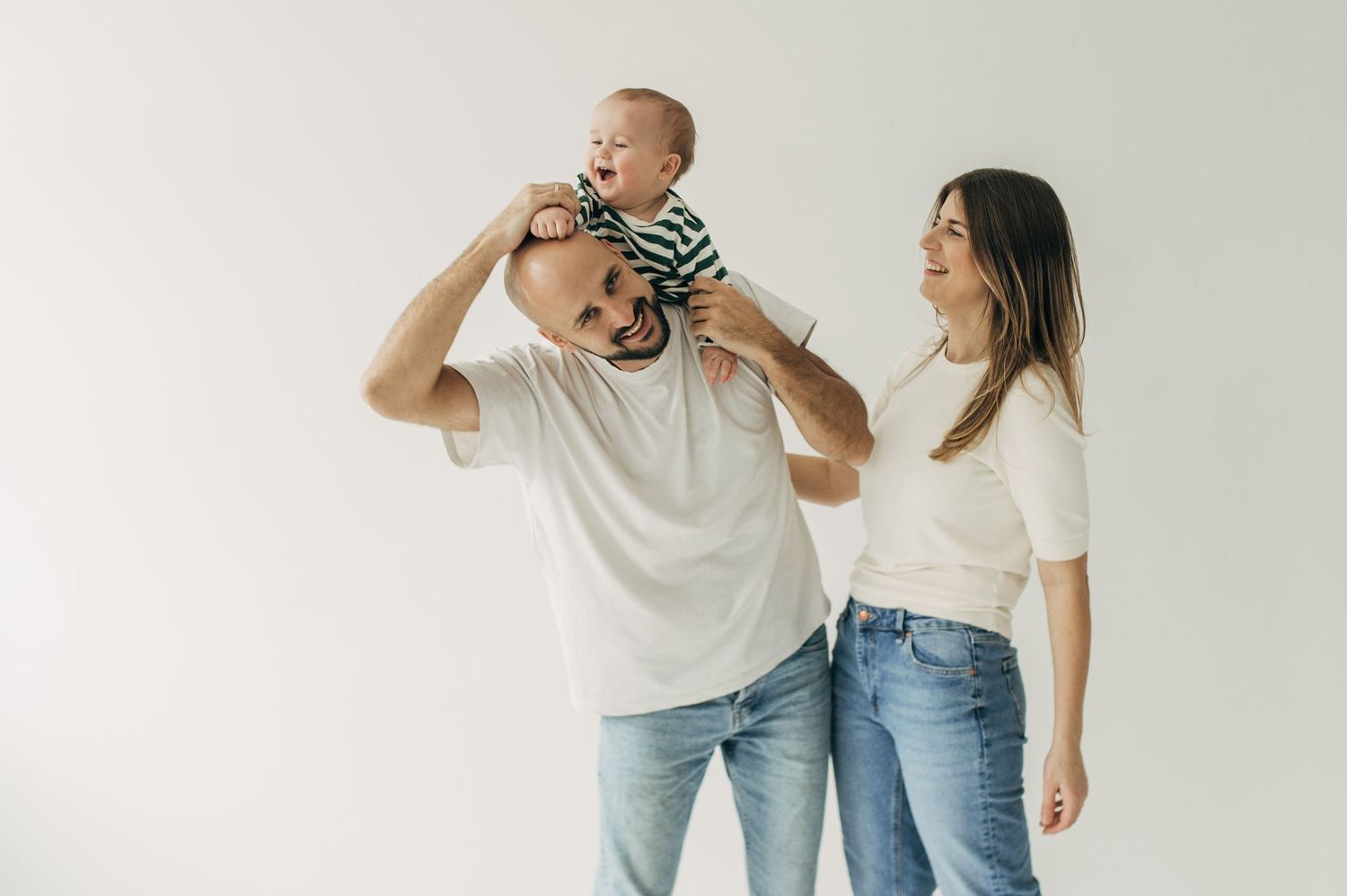 Parent and child interaction series against white background showing joyful playtime.