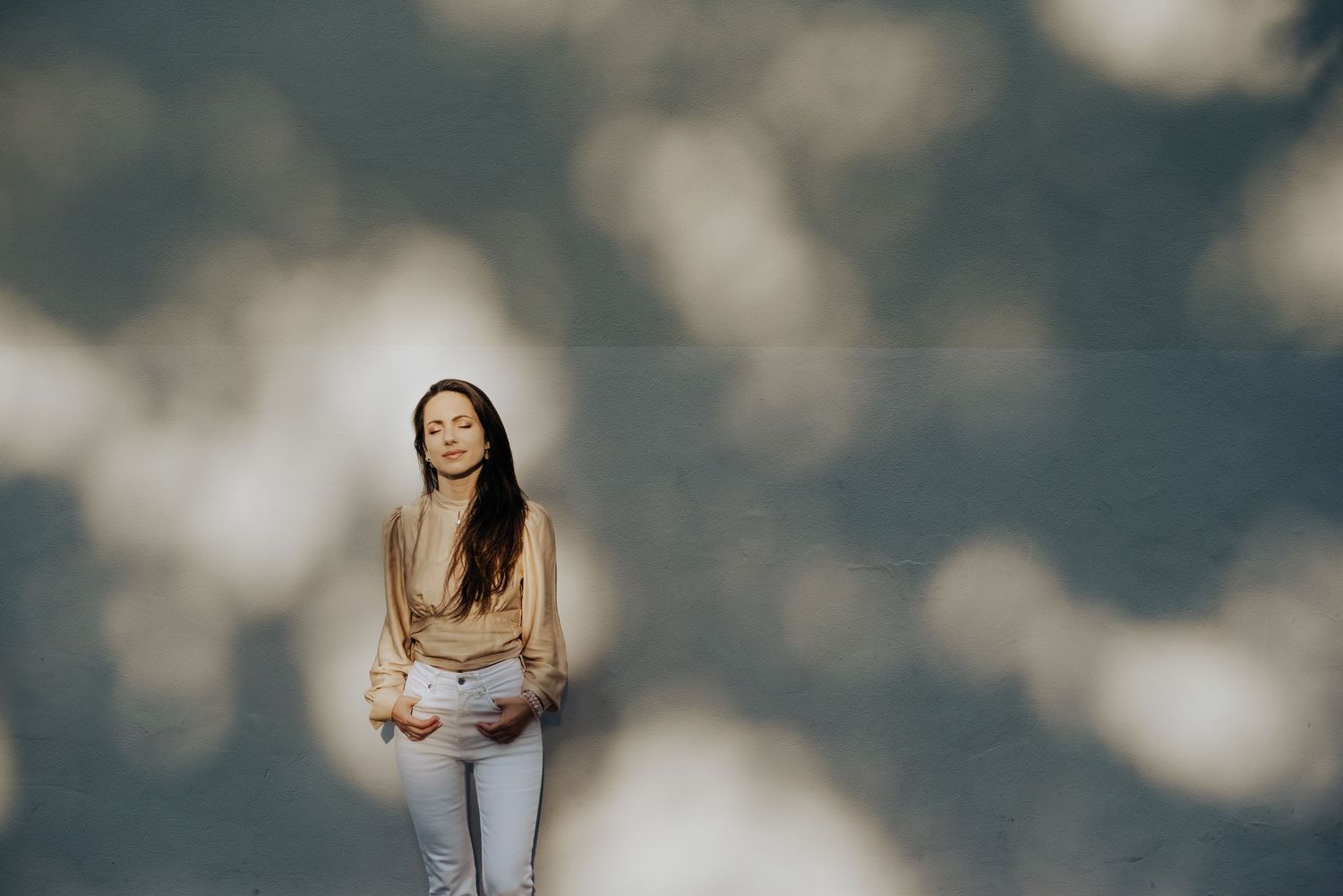 Ethereal portraits with soft bokeh and dreamy cloud-like background effects.