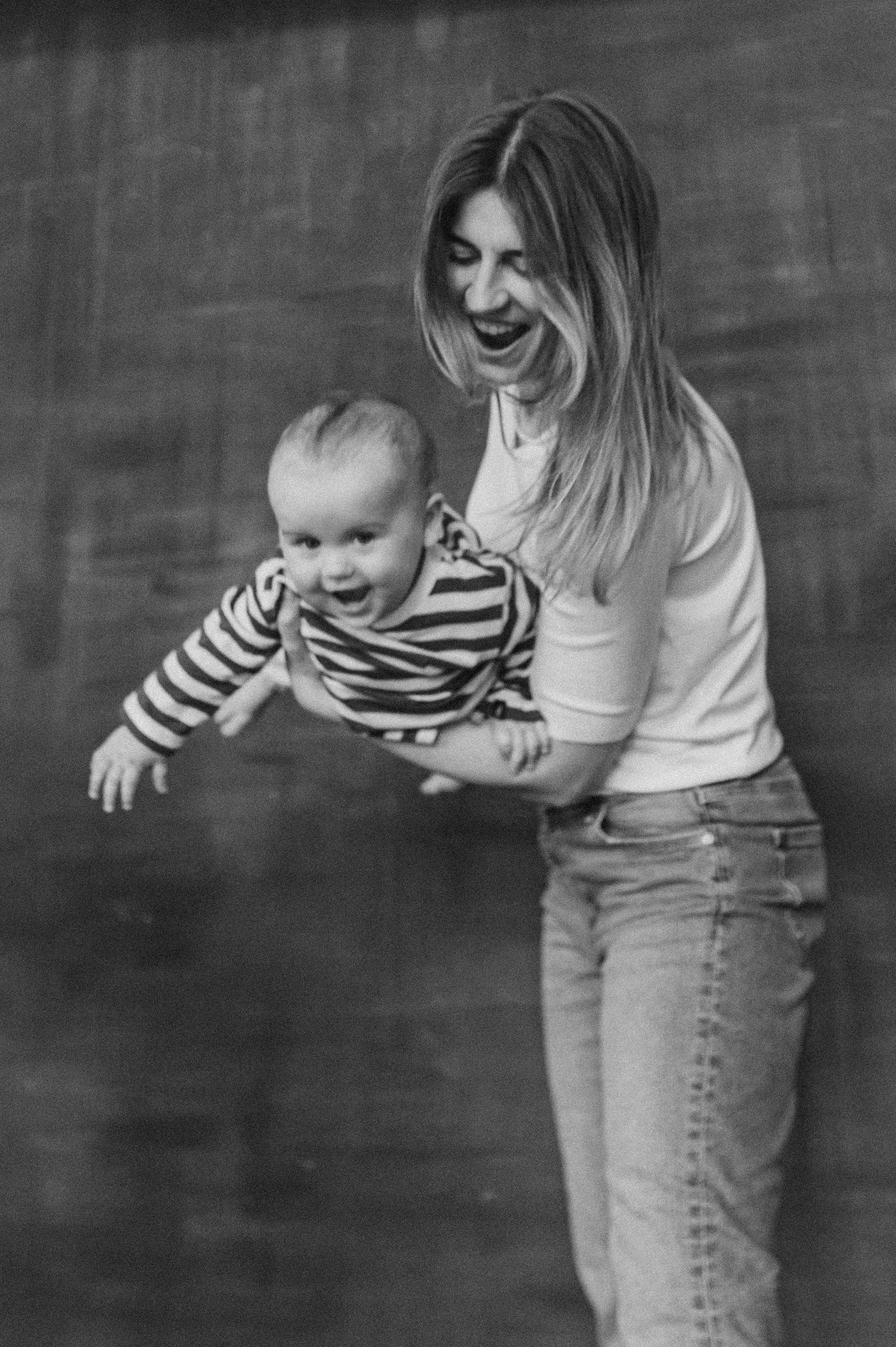 Dynamic black and white series showing movement and interaction between parent and child.