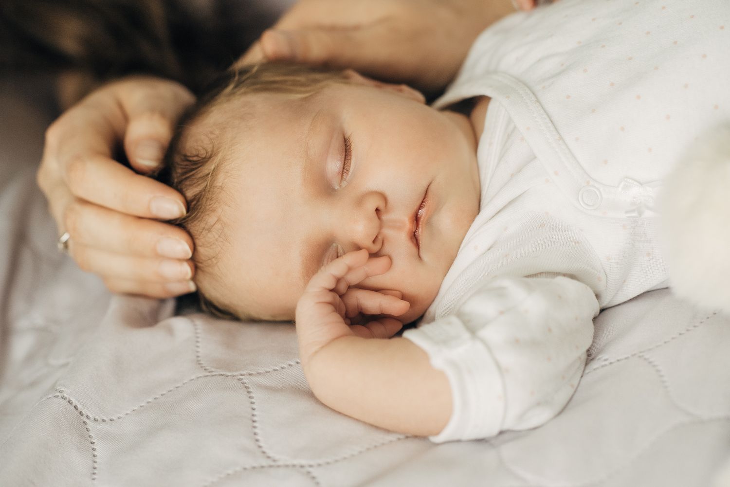 Peaceful nap time moments captured in soft, natural light.