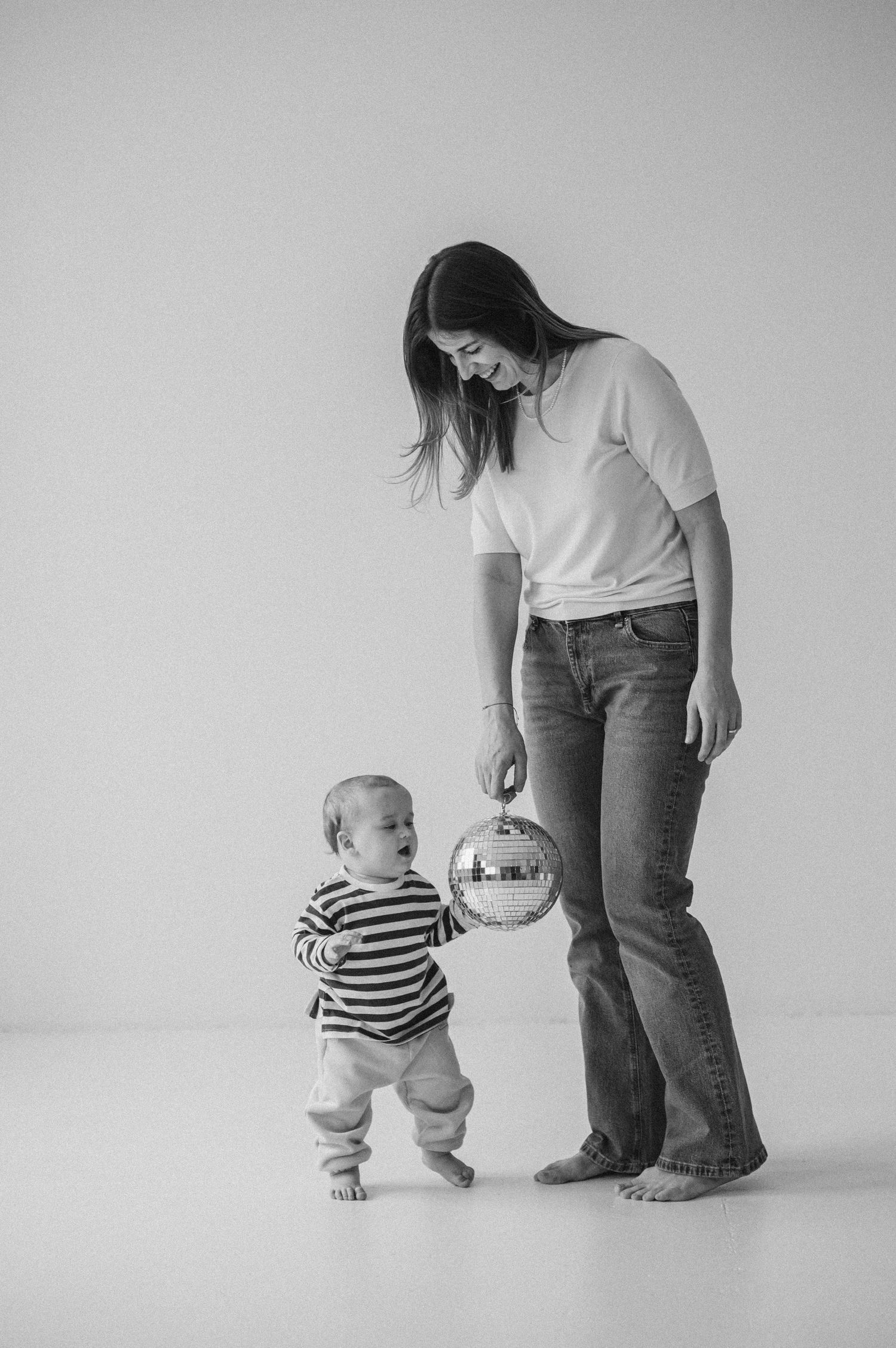 Series showing first steps and walking milestones against minimal grey background.