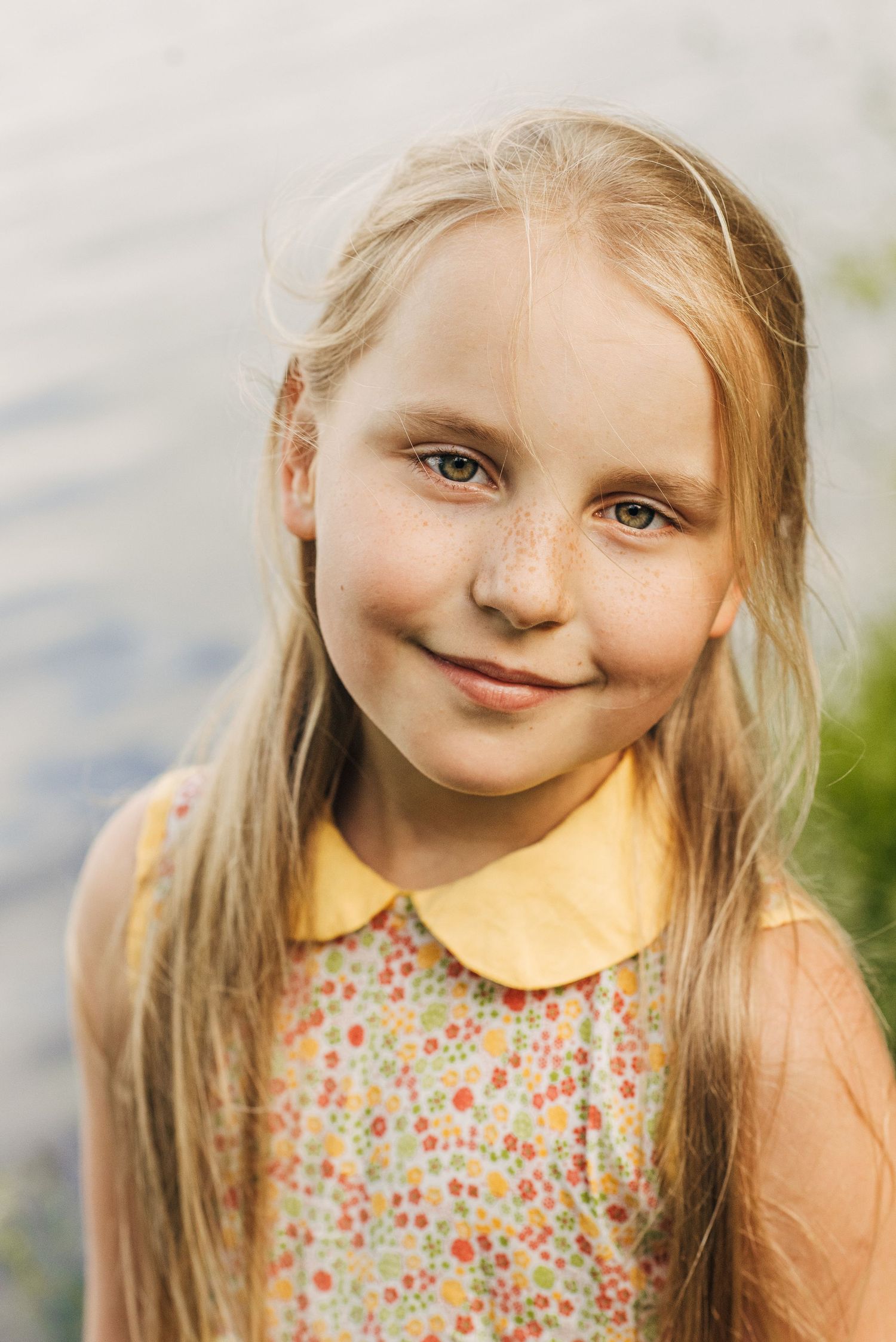 Close-up portrait series showing joyful expressions in natural lighting.