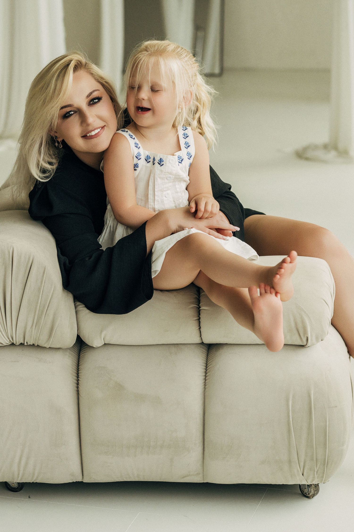 A series of candid lifestyle photos showing playful moments on a light colored couch.